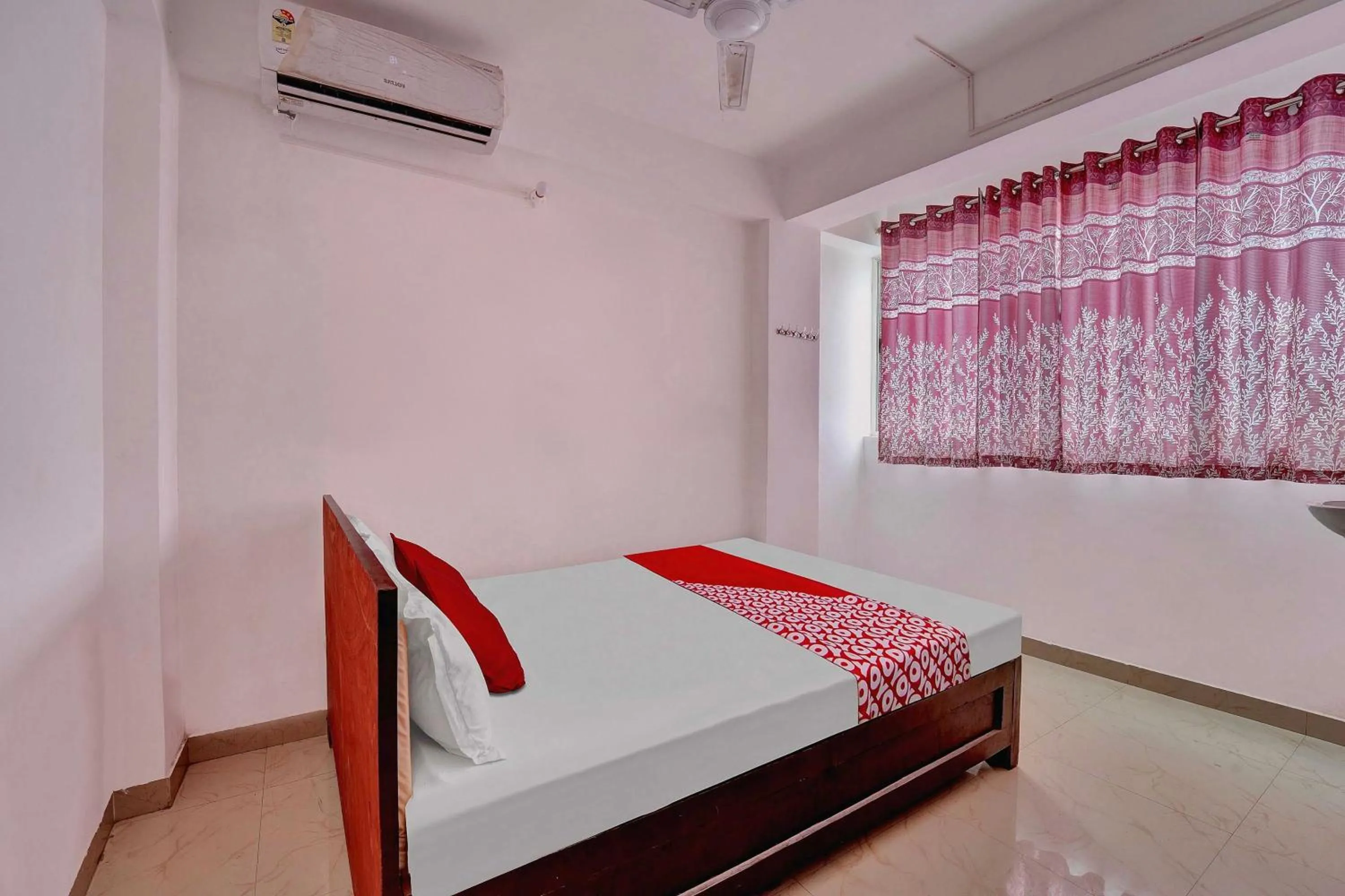 Bedroom in OYO Flagship Hotel Celebrate Inn