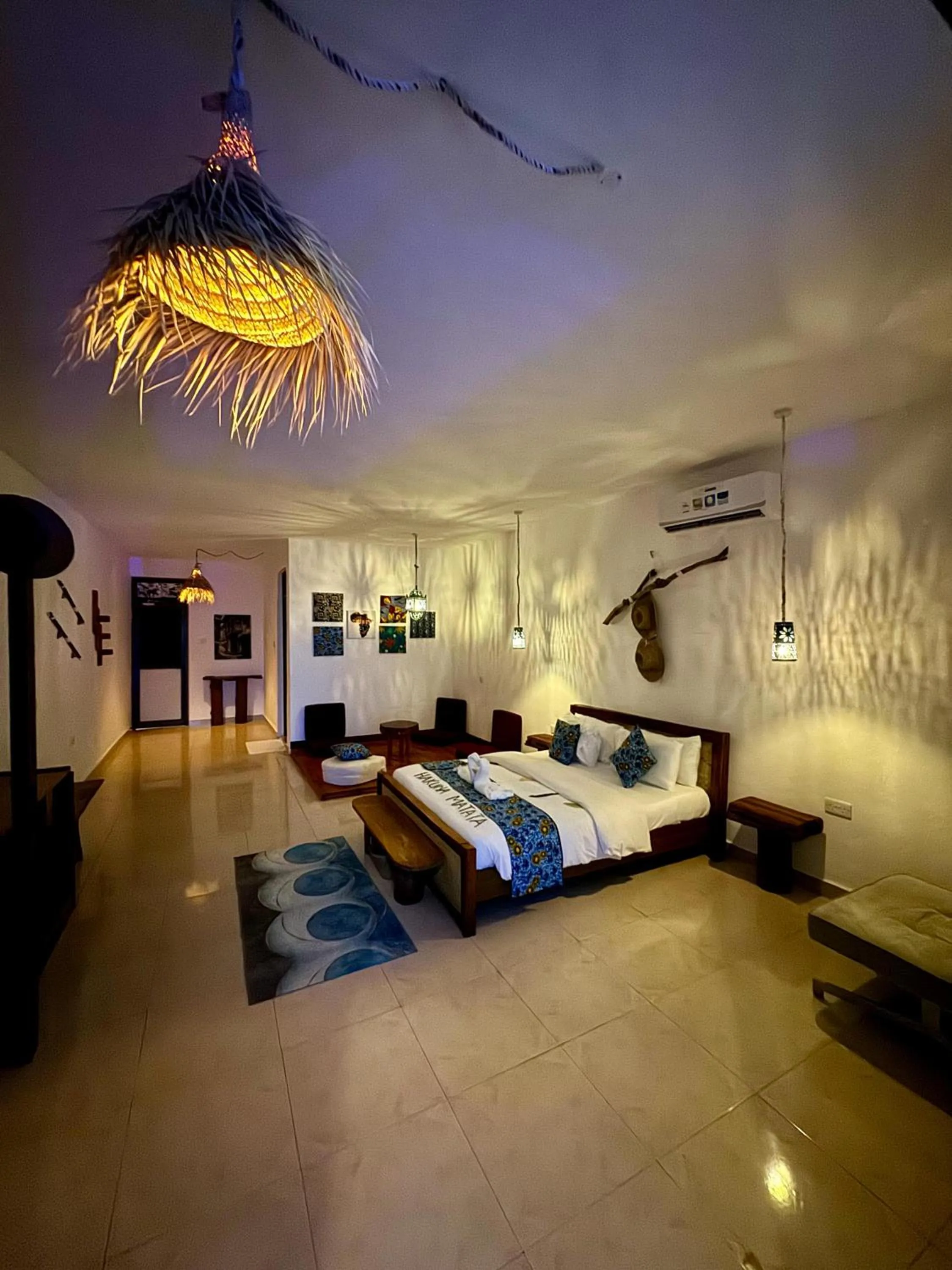 Bed in BIANCO AZZURRO Hotel & Restaurant