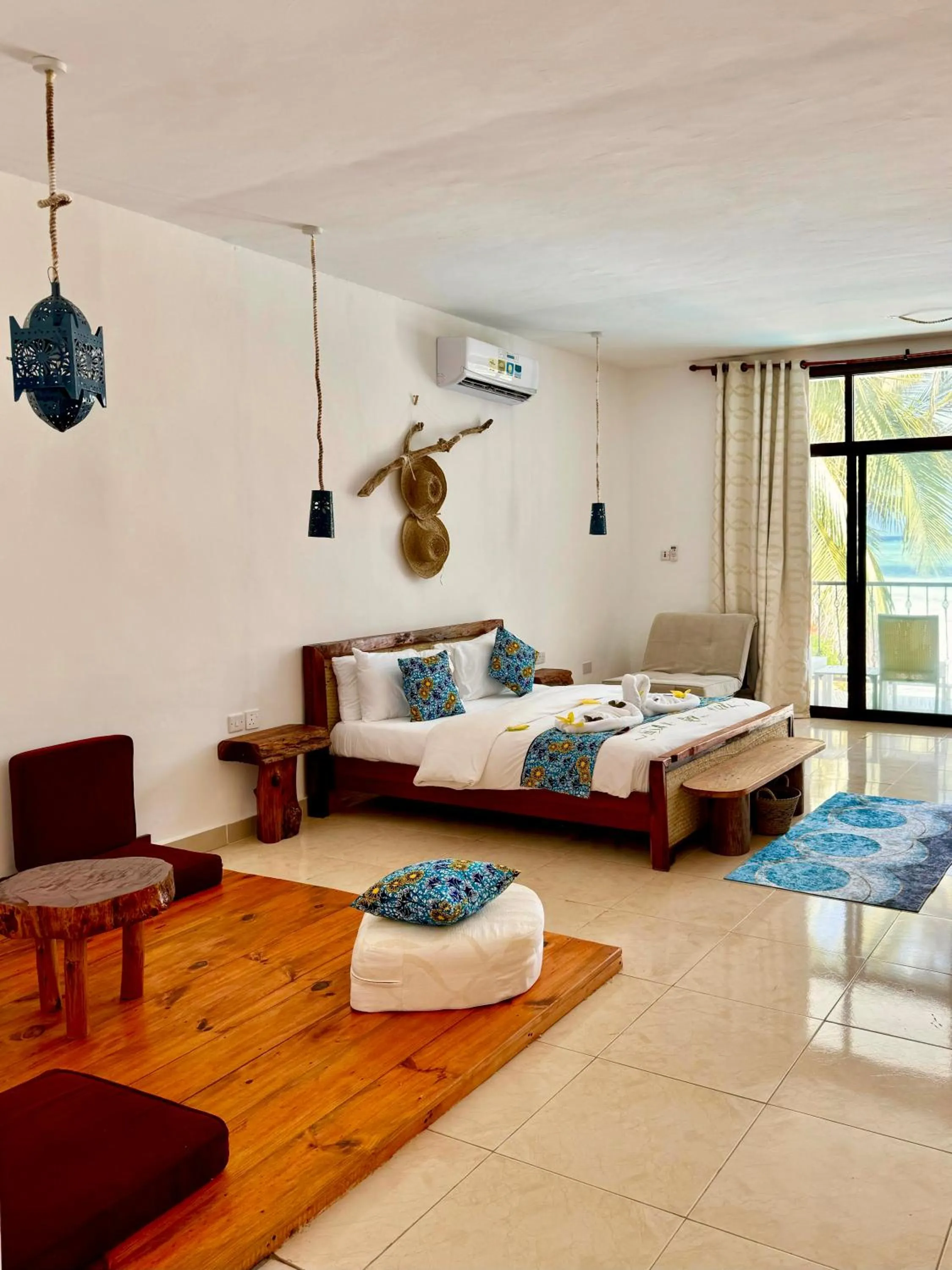 Bed in BIANCO AZZURRO Hotel & Restaurant