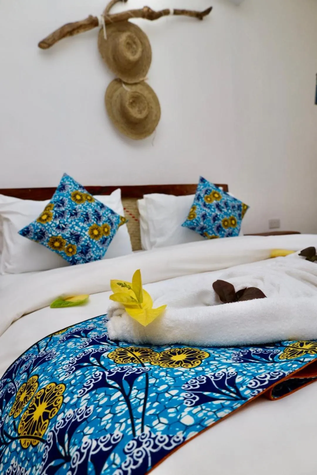 Bed in BIANCO AZZURRO Hotel & Restaurant