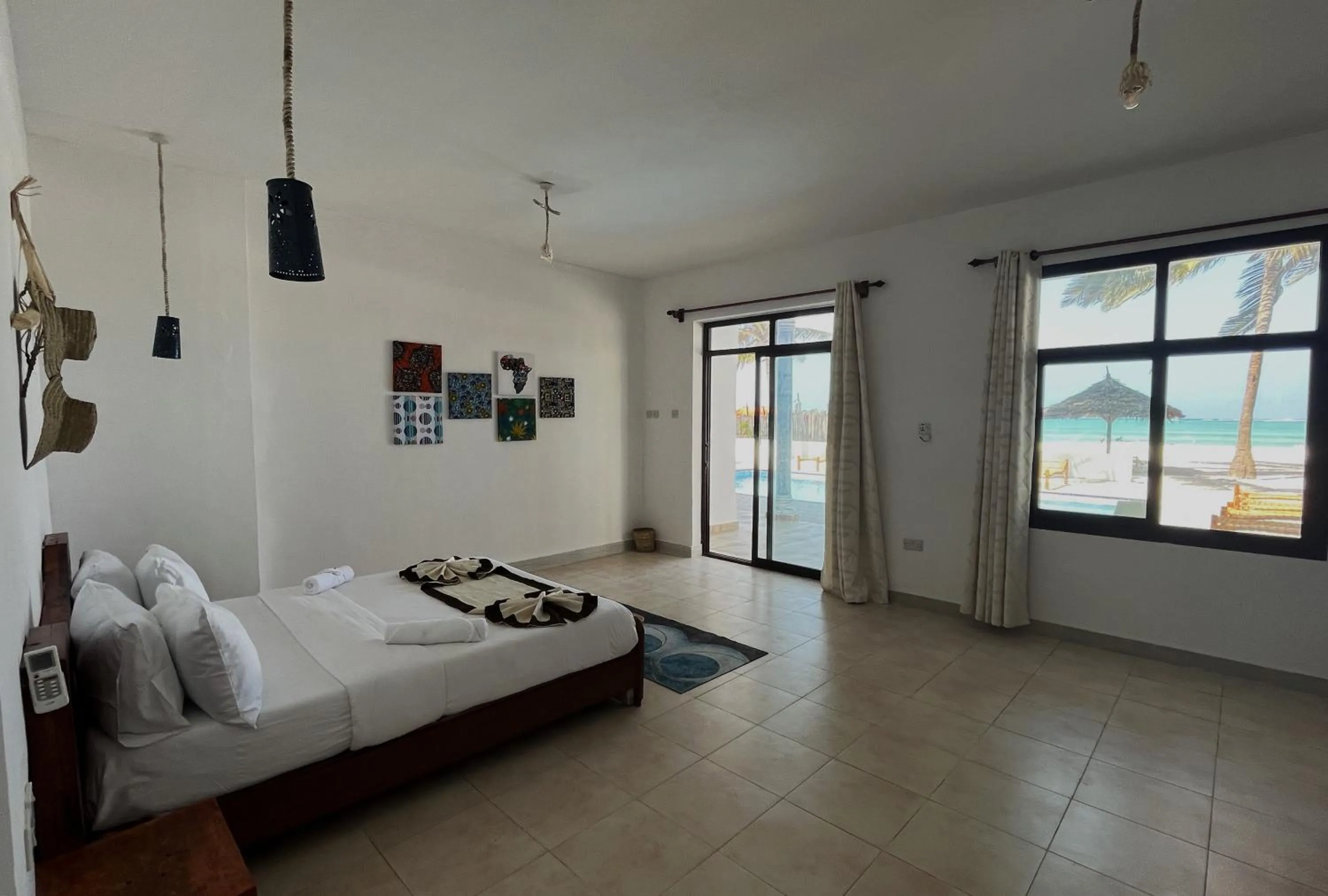 Bed in BIANCO AZZURRO Hotel & Restaurant