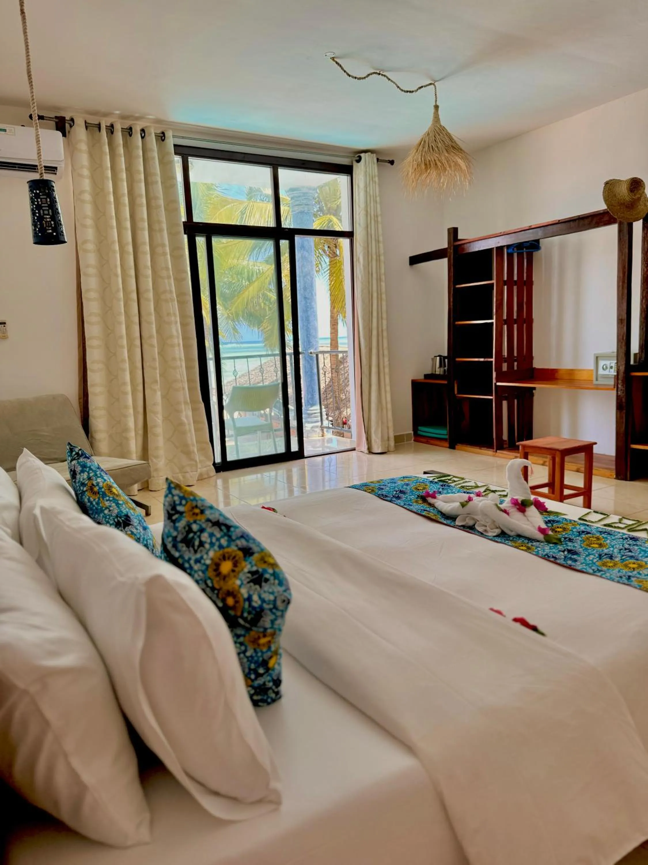 Bed in BIANCO AZZURRO Hotel & Restaurant