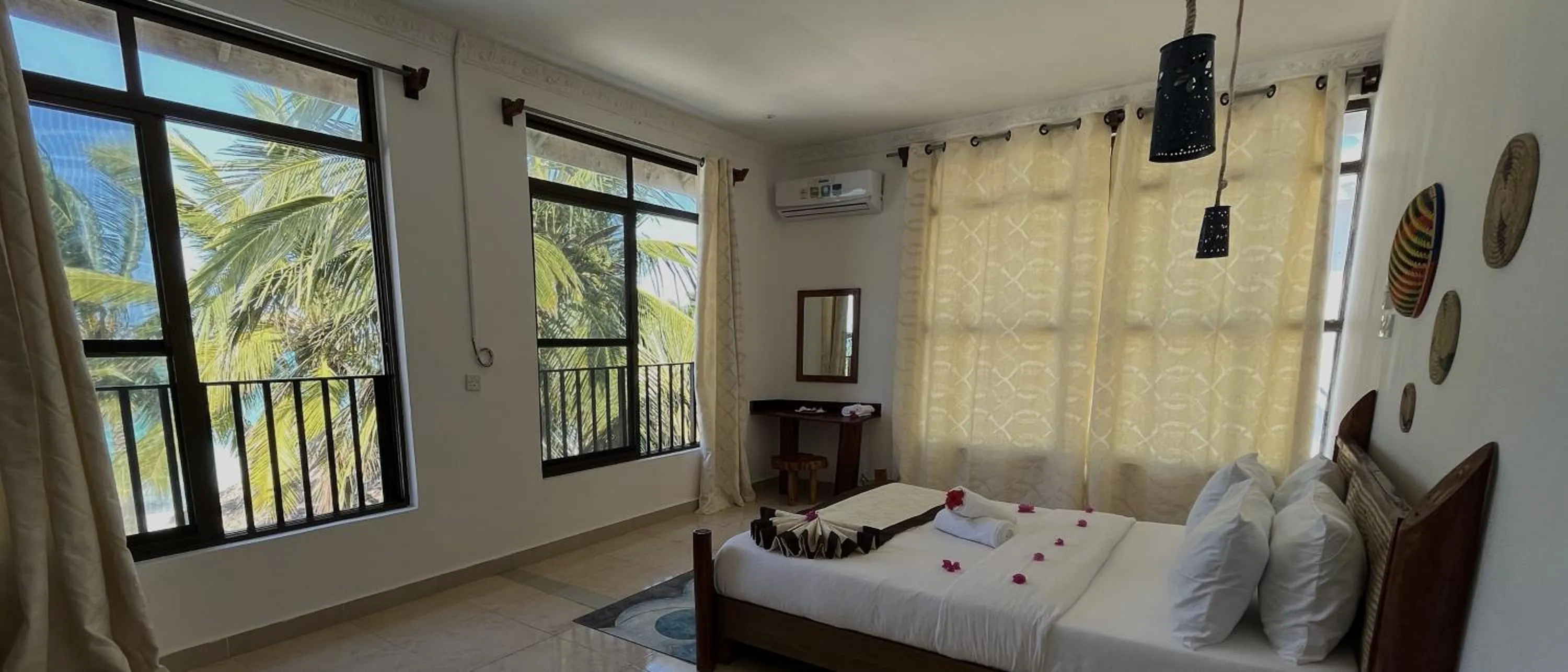 Bed in BIANCO AZZURRO Hotel & Restaurant