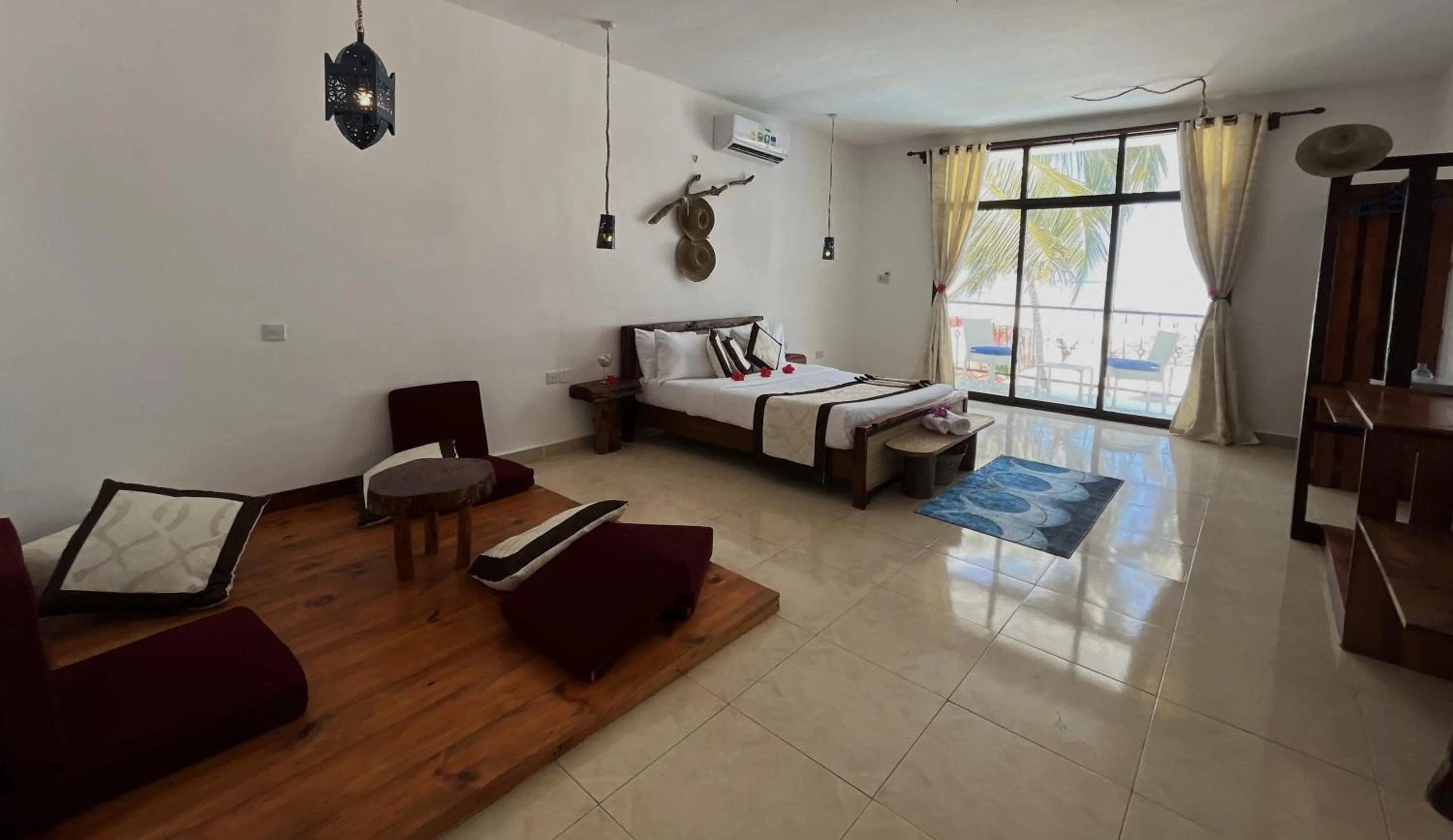 Bed in BIANCO AZZURRO Hotel & Restaurant