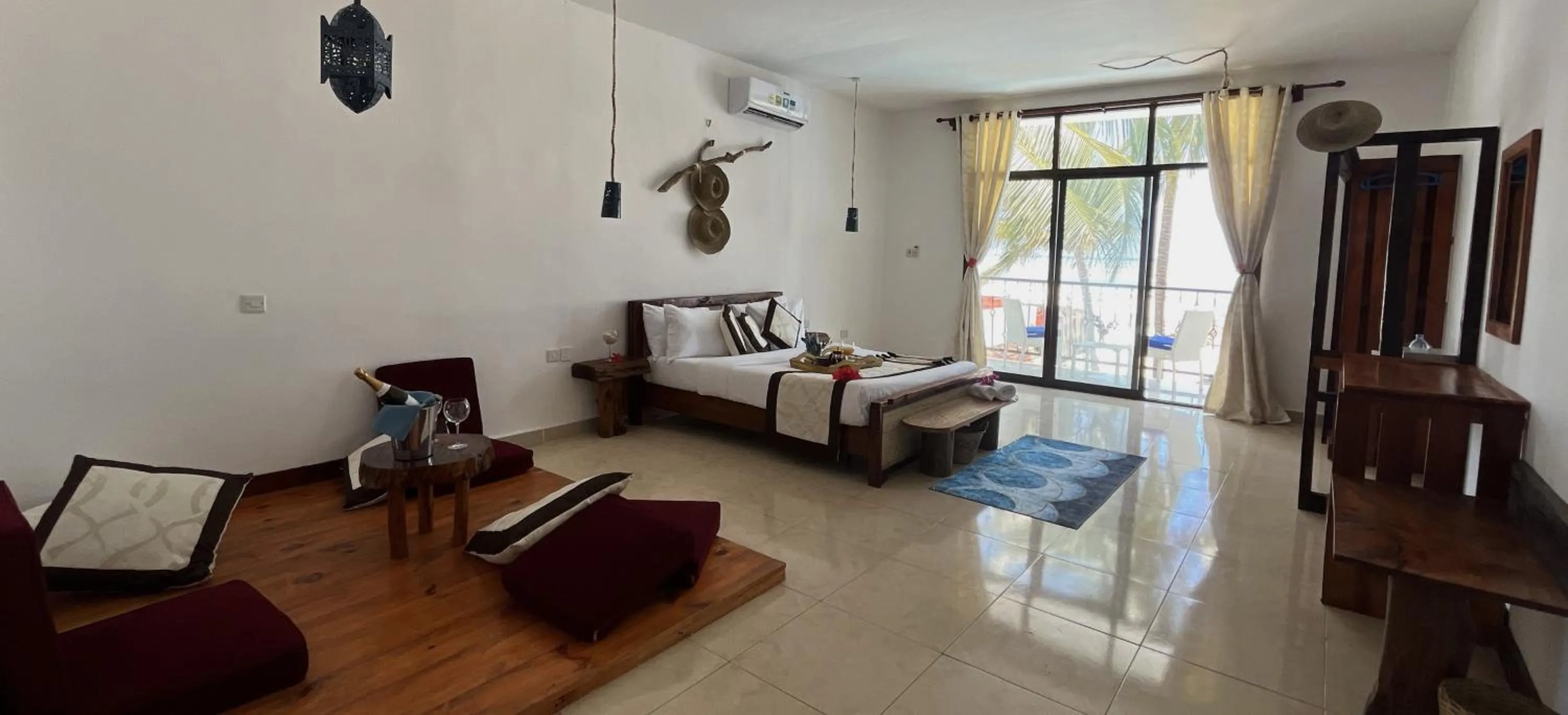 Bed in BIANCO AZZURRO Hotel & Restaurant