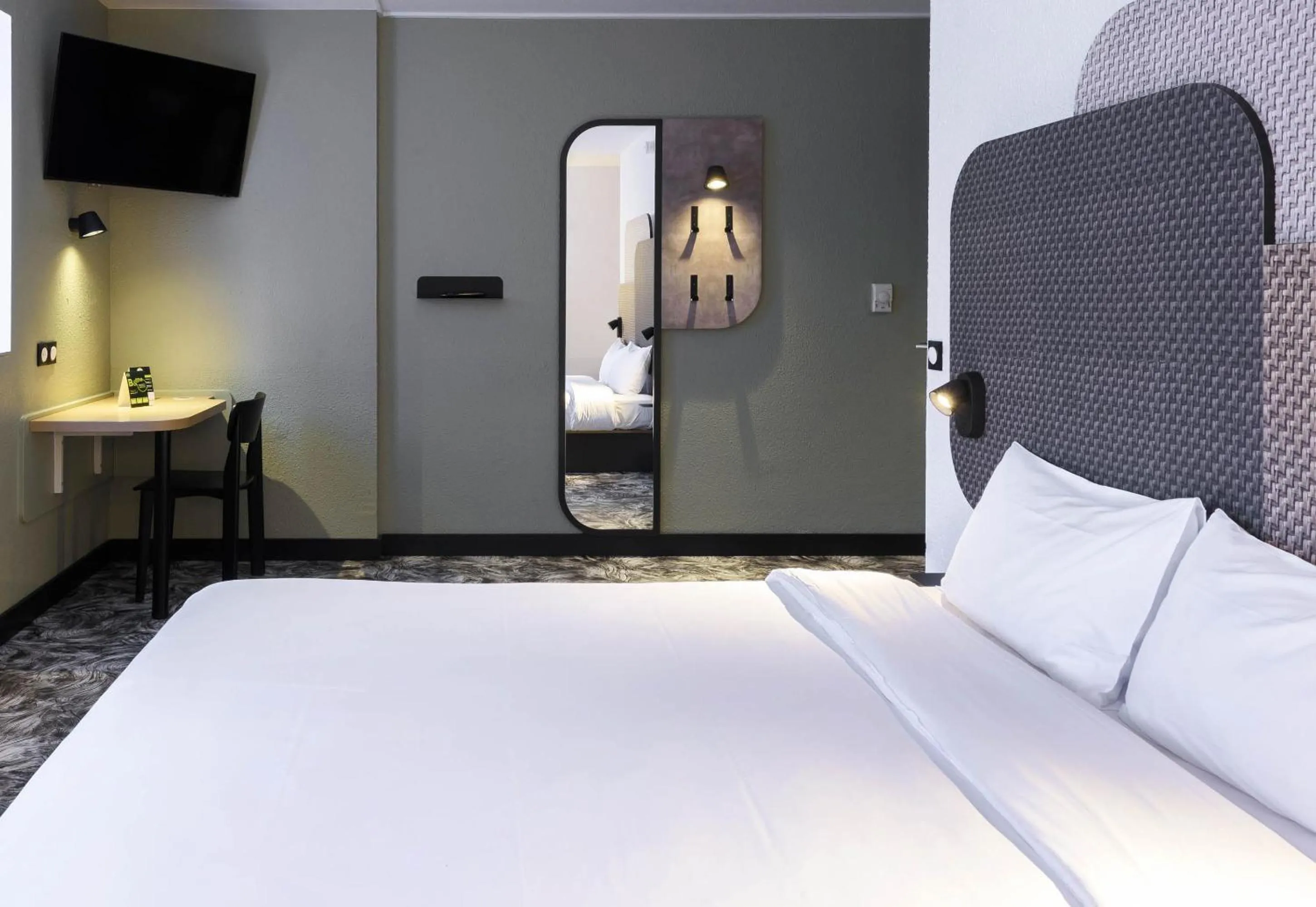 Bed in B&B HOTEL Toulouse Cité de l'Espace Gonord