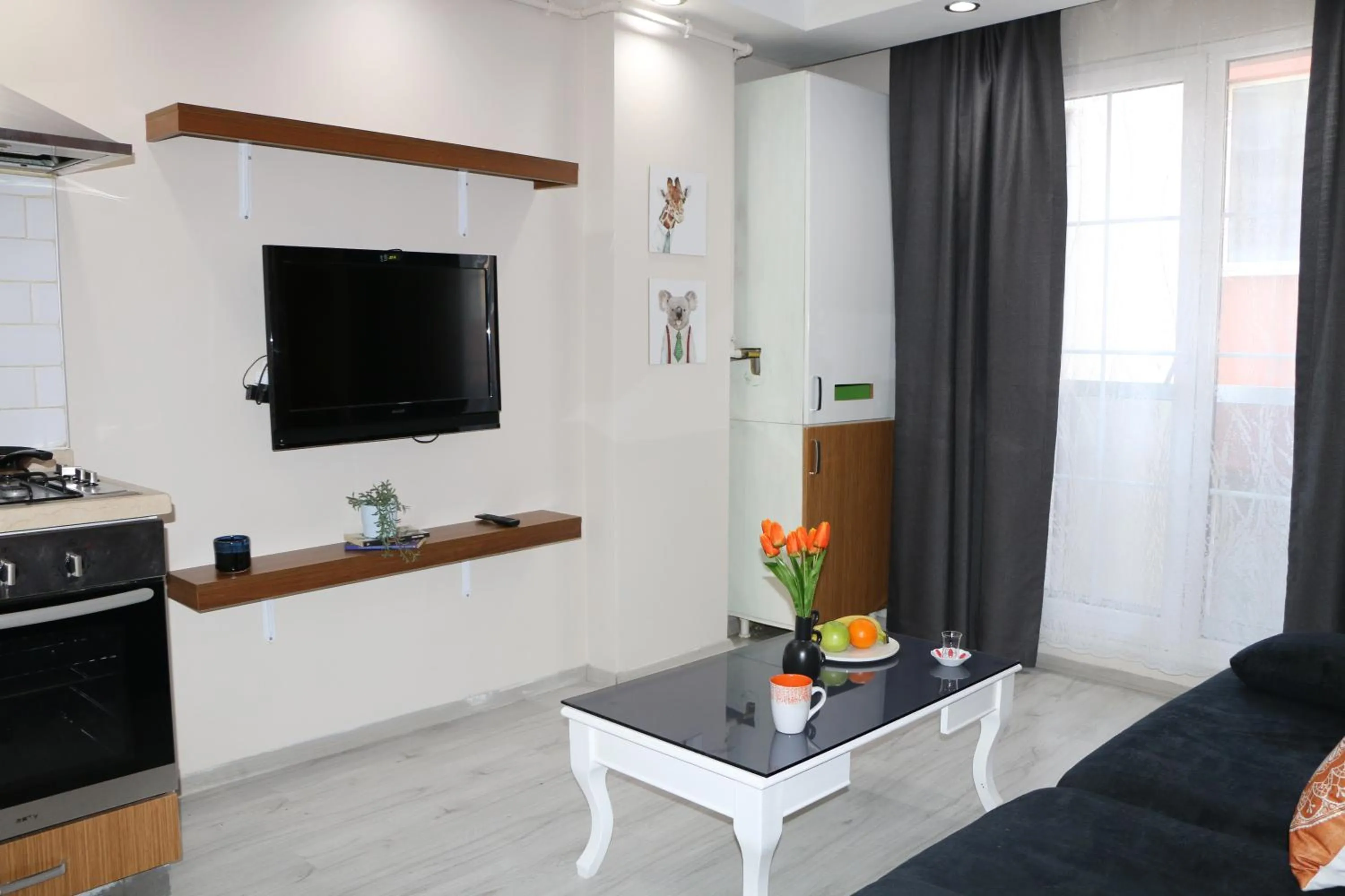 Communal lounge/ TV room in THE MOST HOTEL