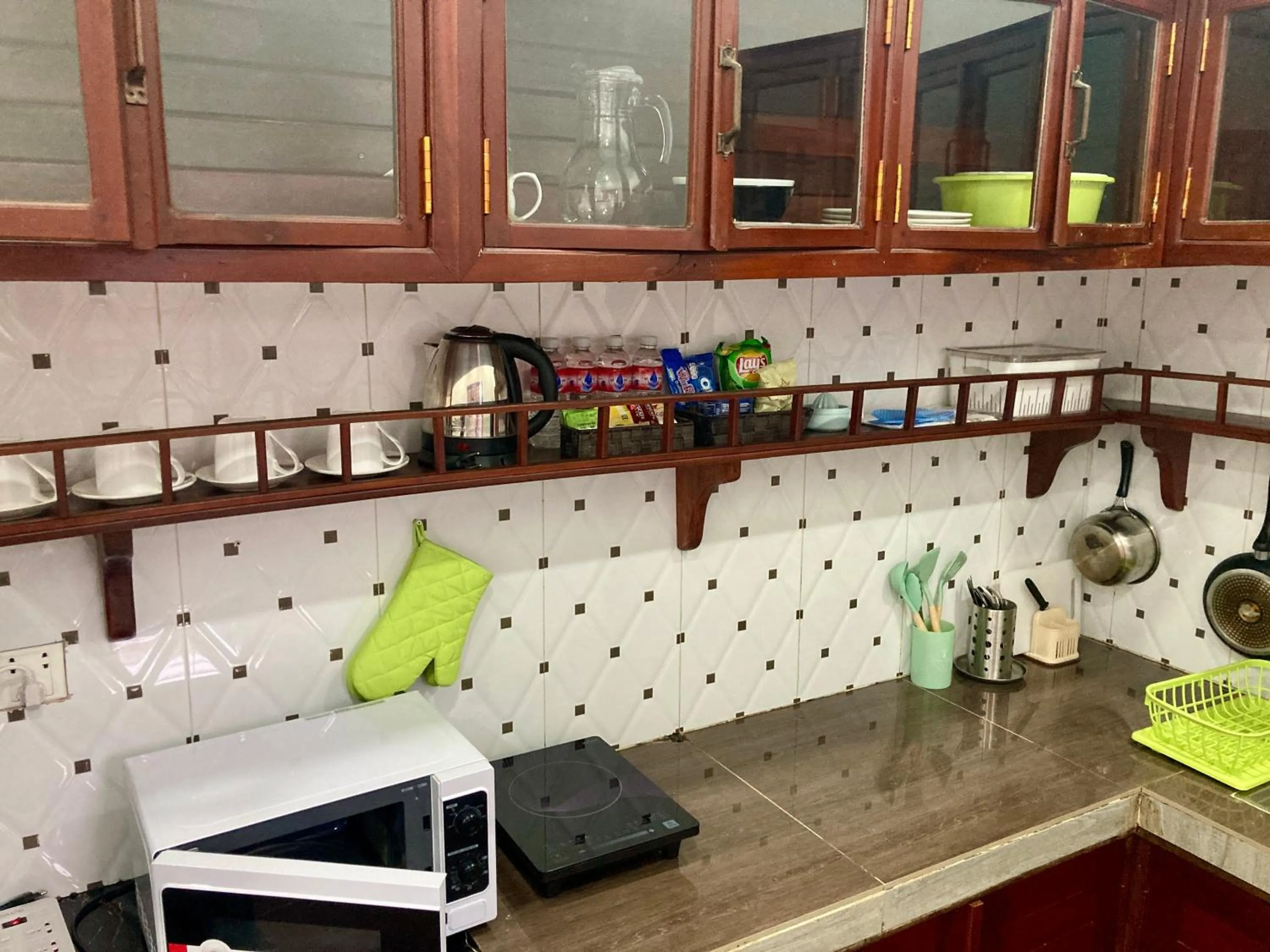 Kitchen or kitchenette in Lotus Haven Villa