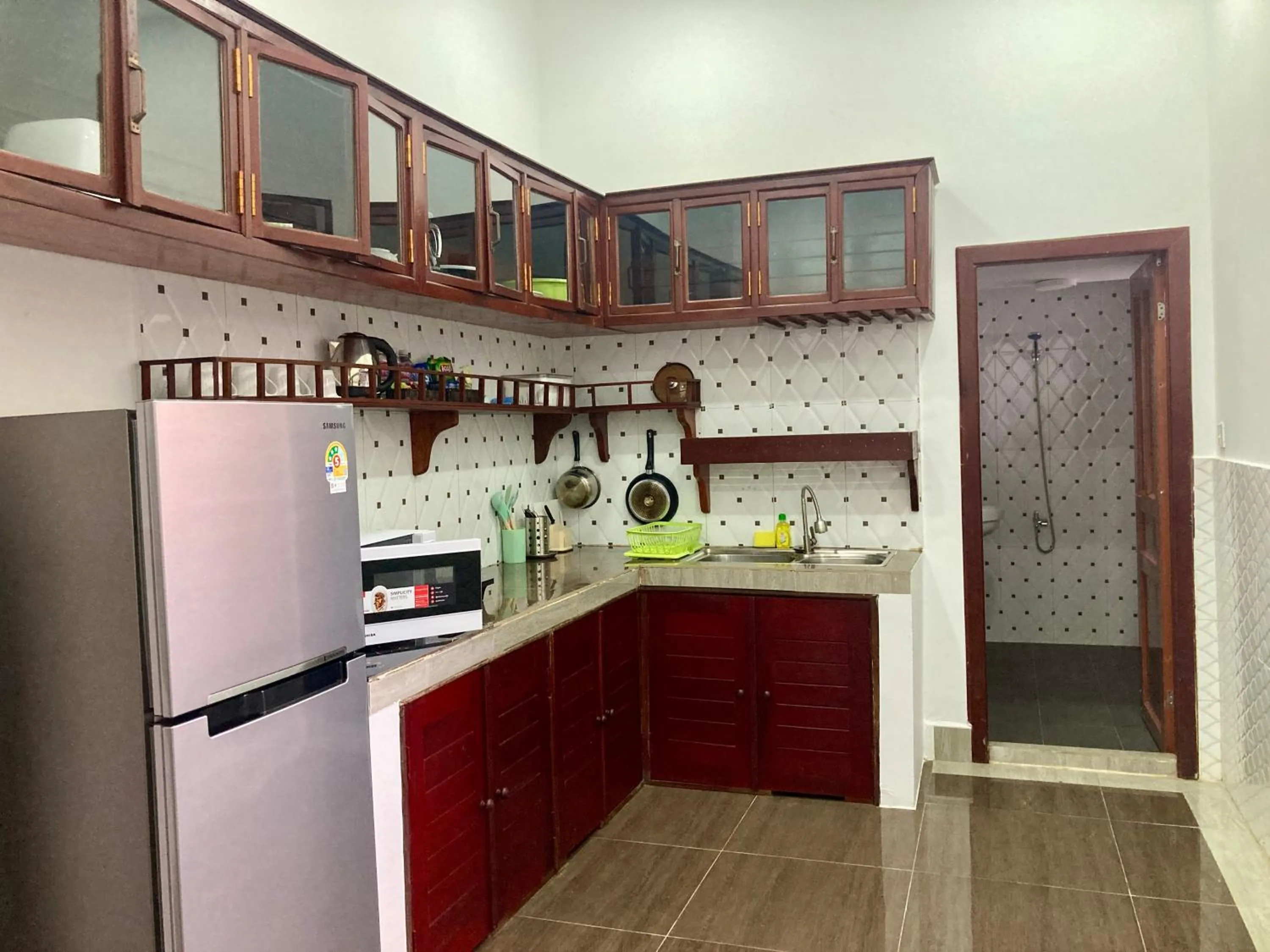 Kitchen or kitchenette in Lotus Haven Villa