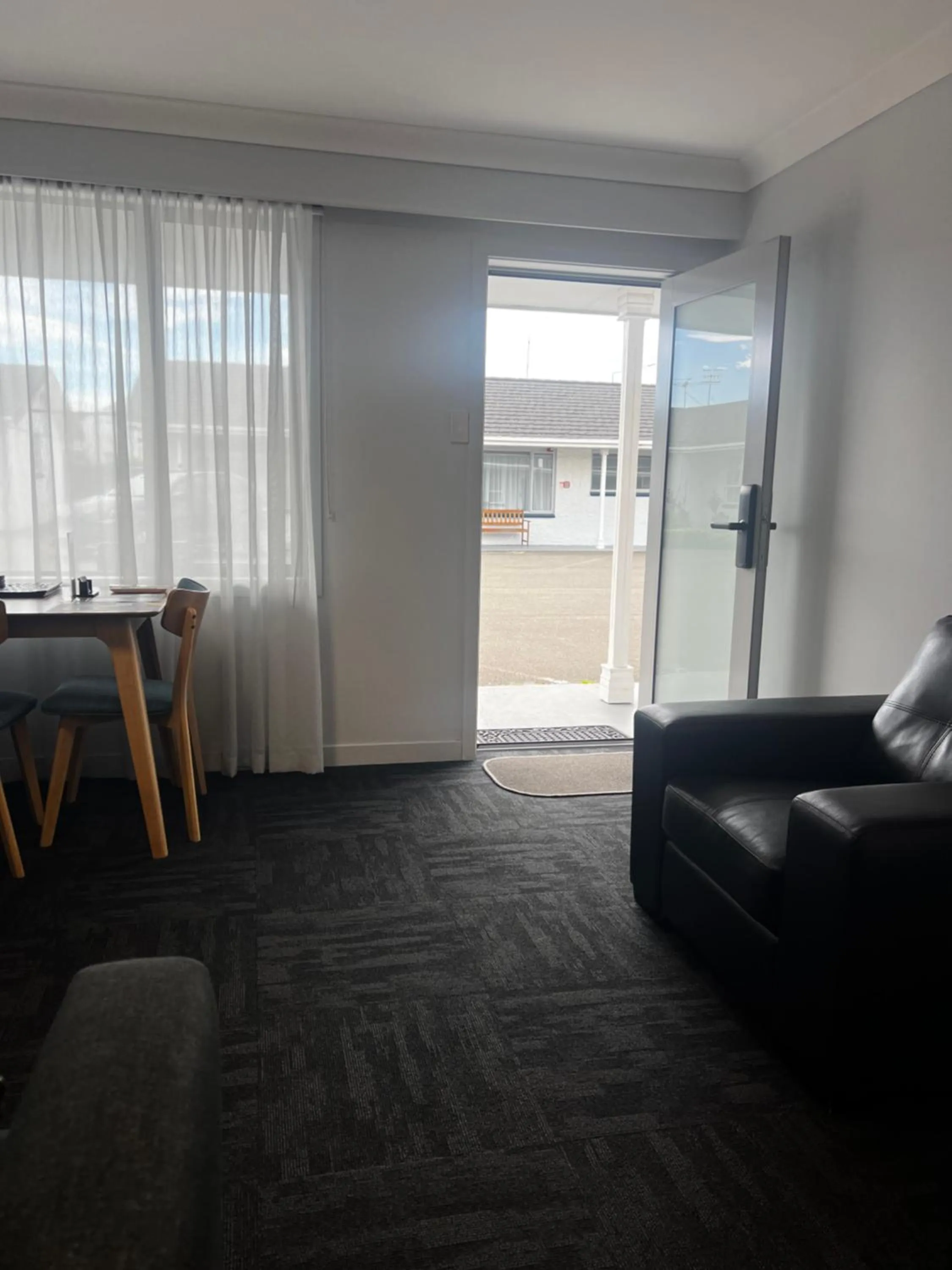 Living room in ASURE Surrey Court Motel Invercargill