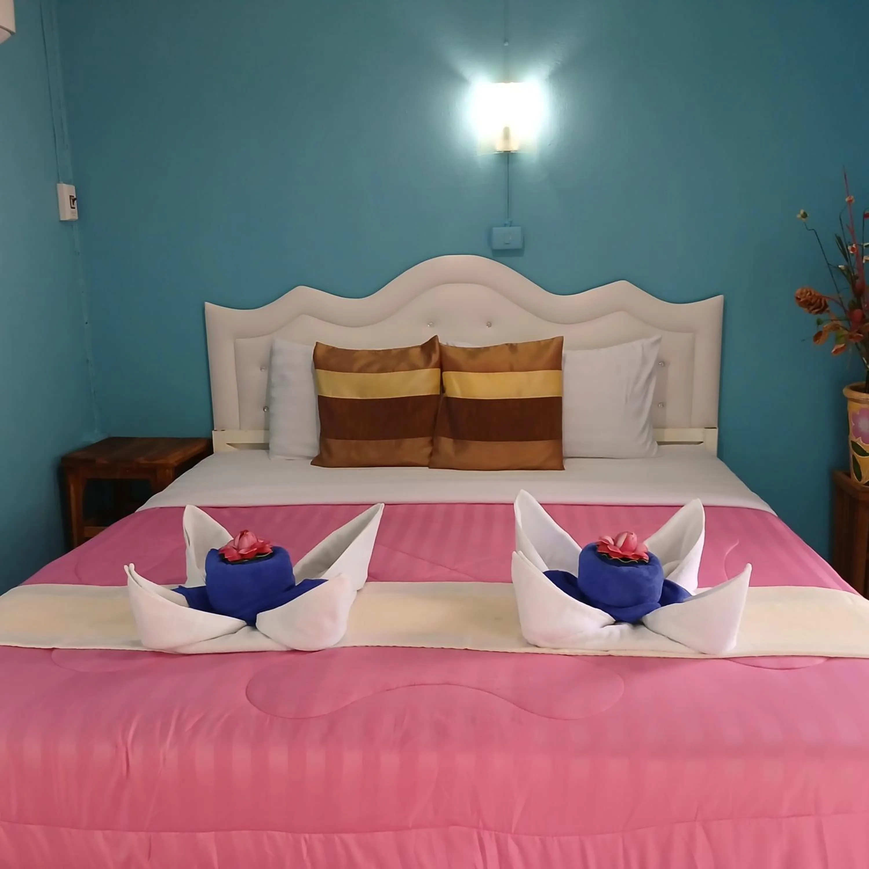 Bed in Thai Garden​ Resort​ Kanchanaburi​