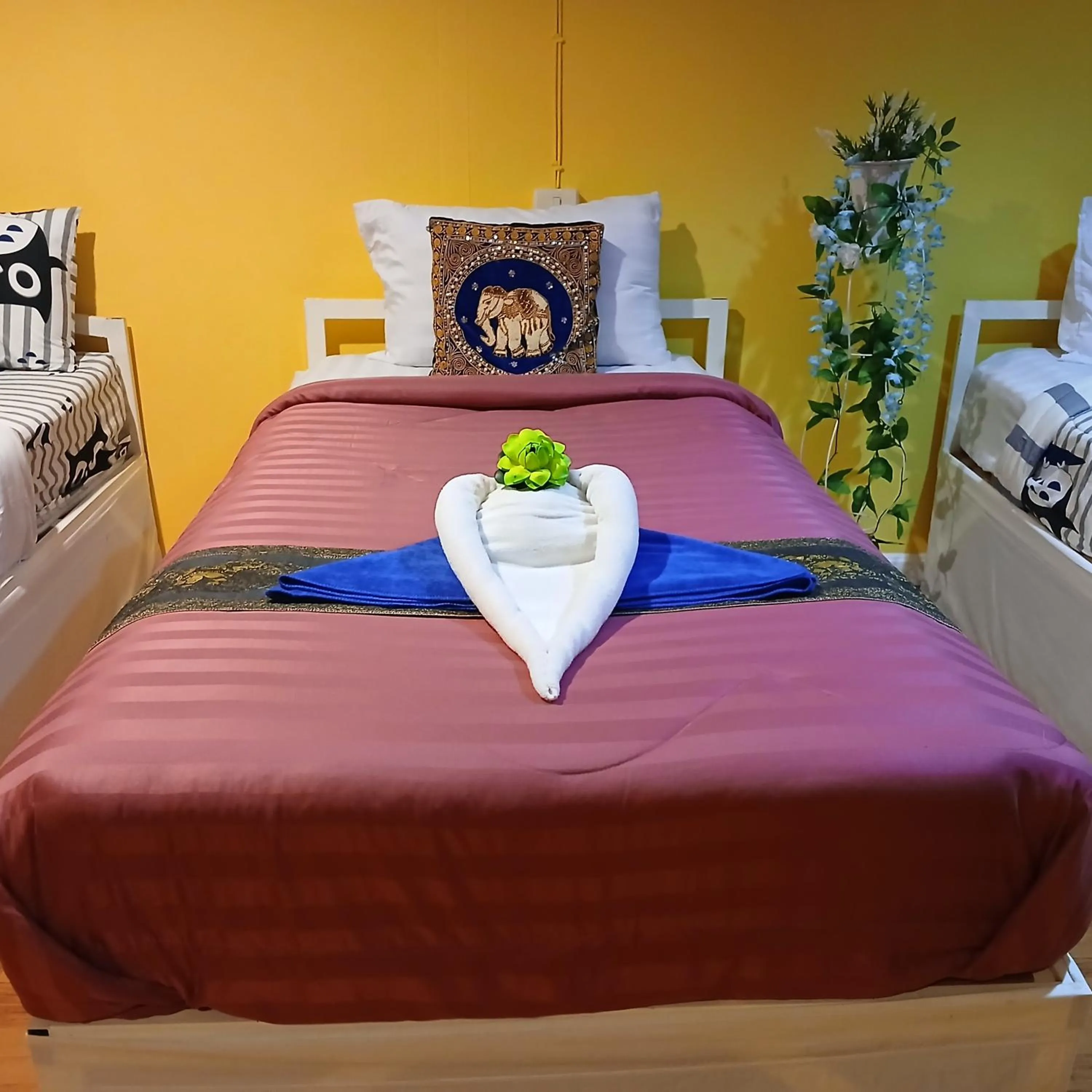 Bed in Thai Garden​ Resort​ Kanchanaburi​