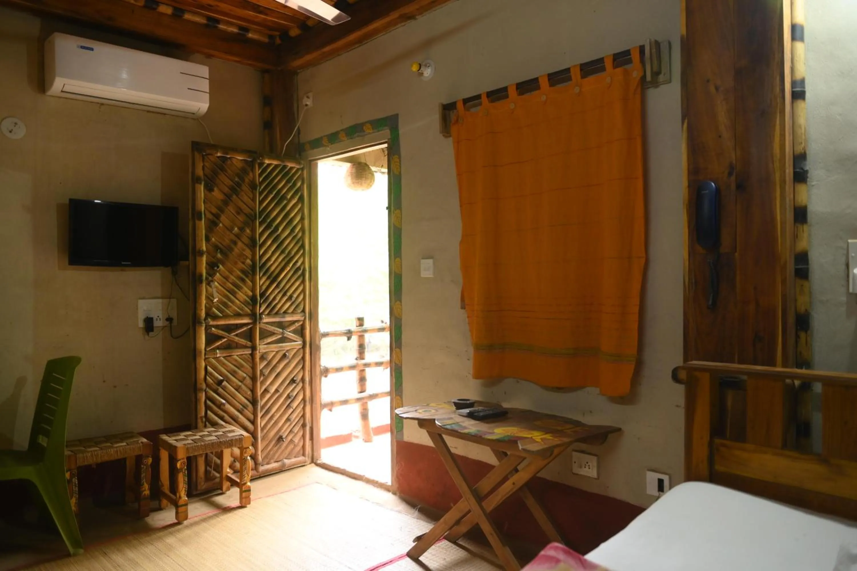 Communal lounge/ TV room in Ram Shyam Village Resort