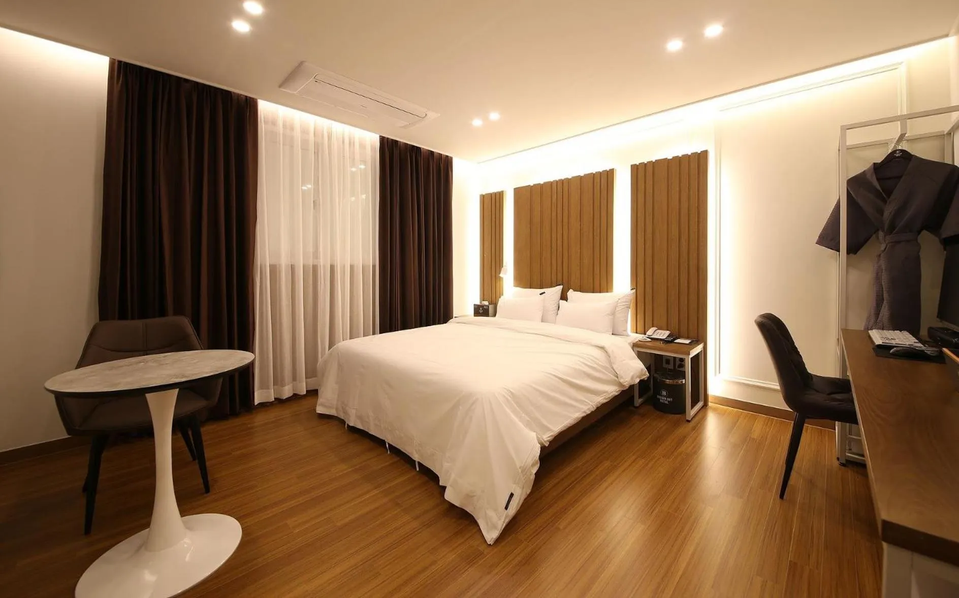 Bed in Brown Dot Hotel Sinan