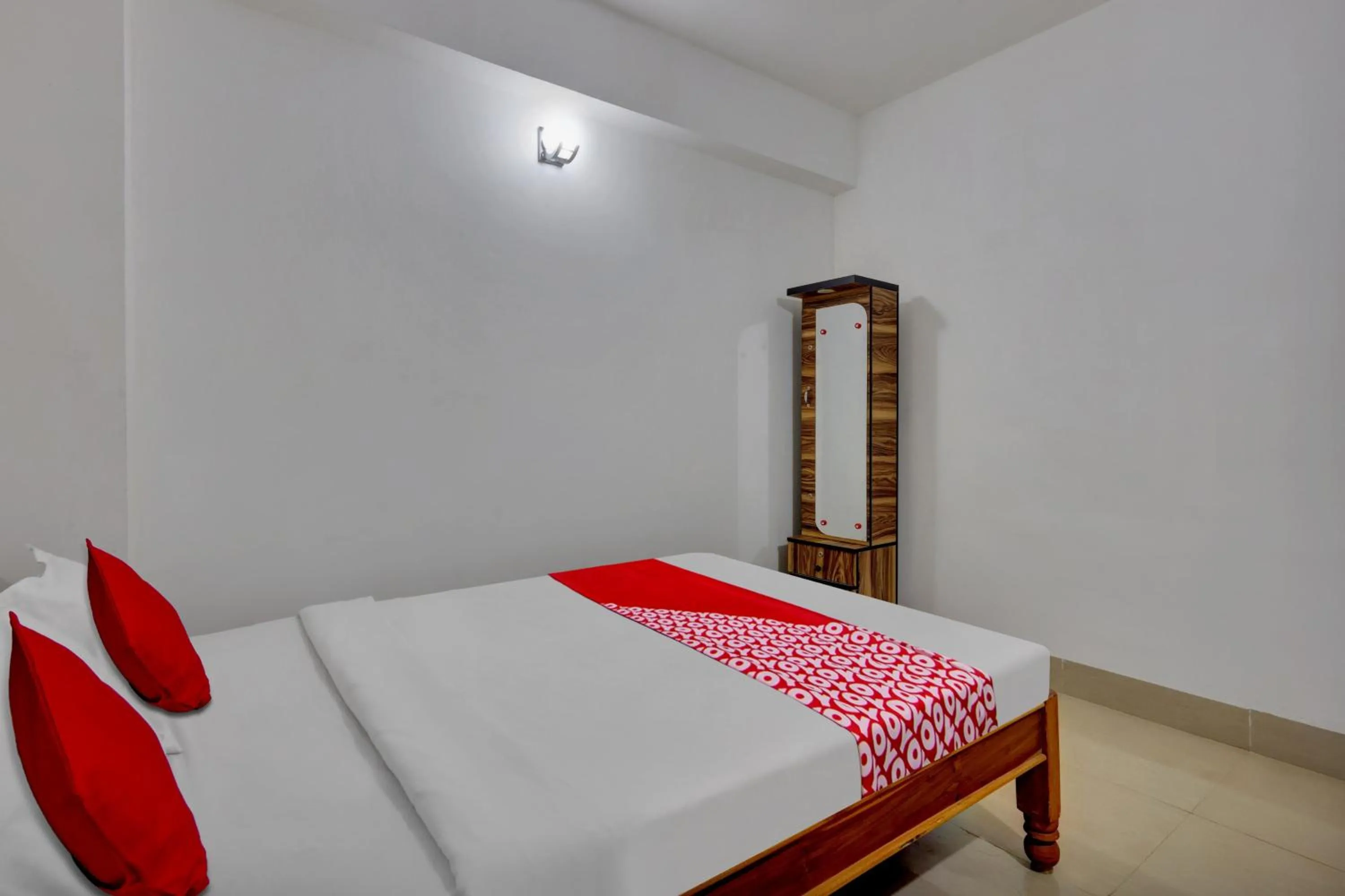 Bedroom in OYO Flagship Larica Green Valley