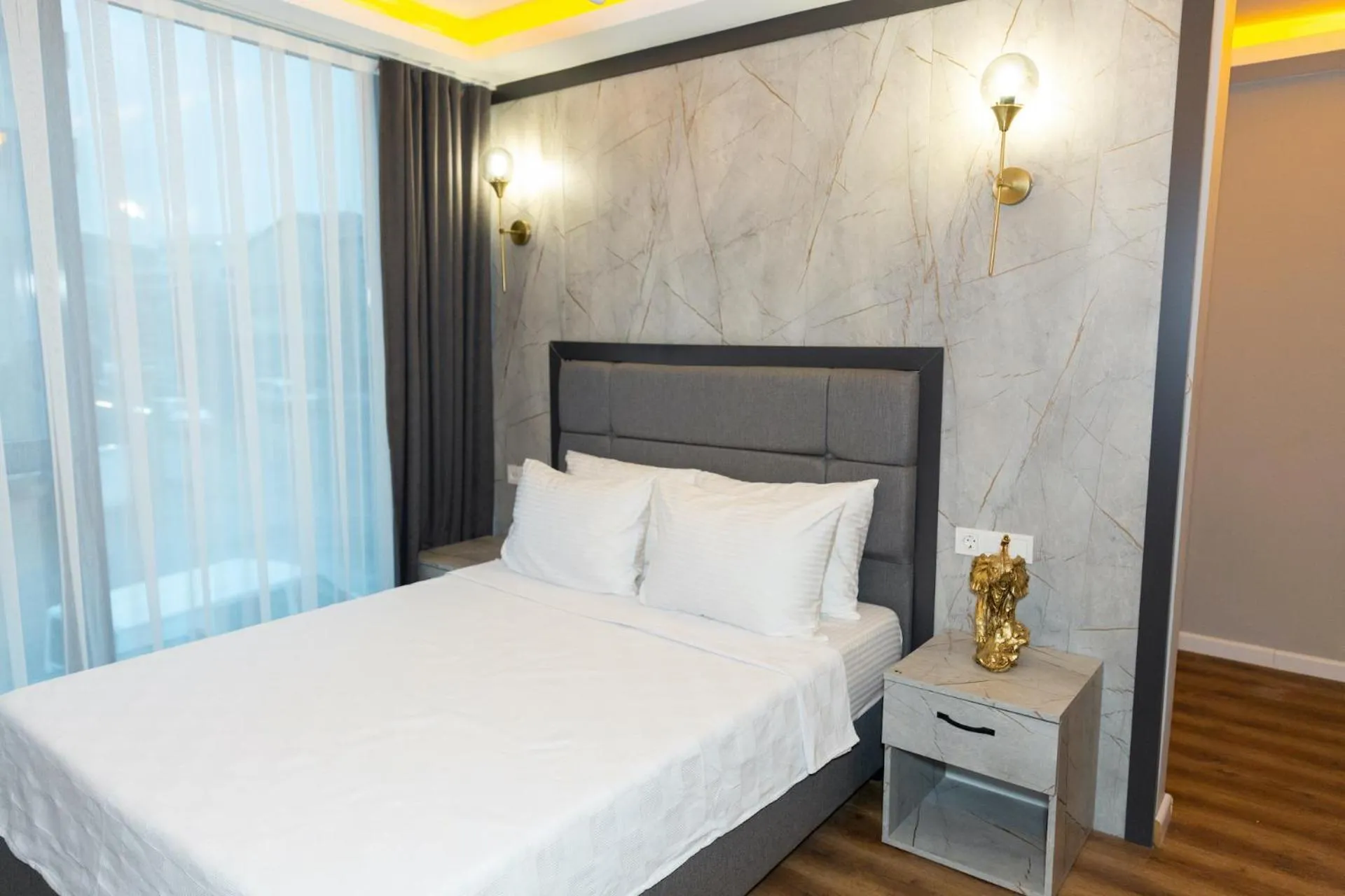 Bed in The Hera Business Hotels & Spa