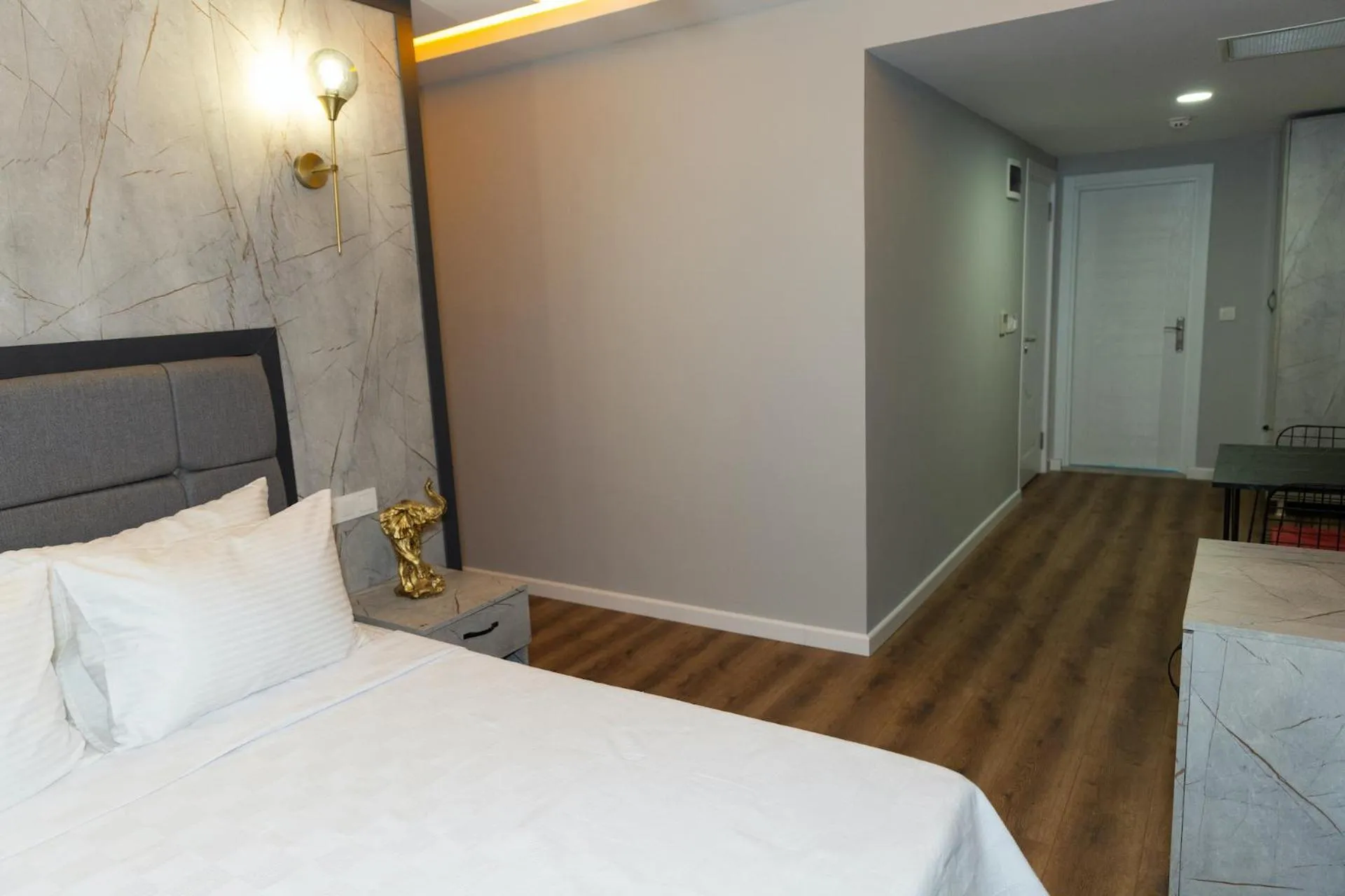 Bed in The Hera Business Hotels & Spa