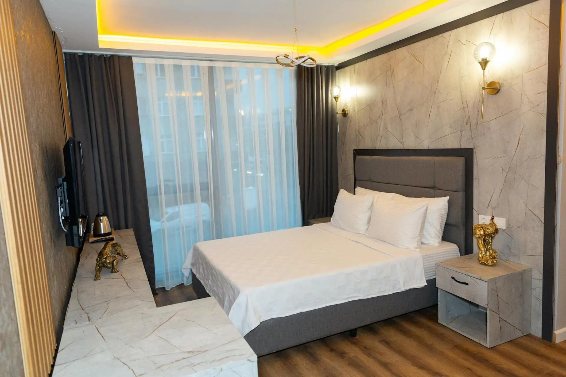 Bed in The Hera Business Hotels & Spa