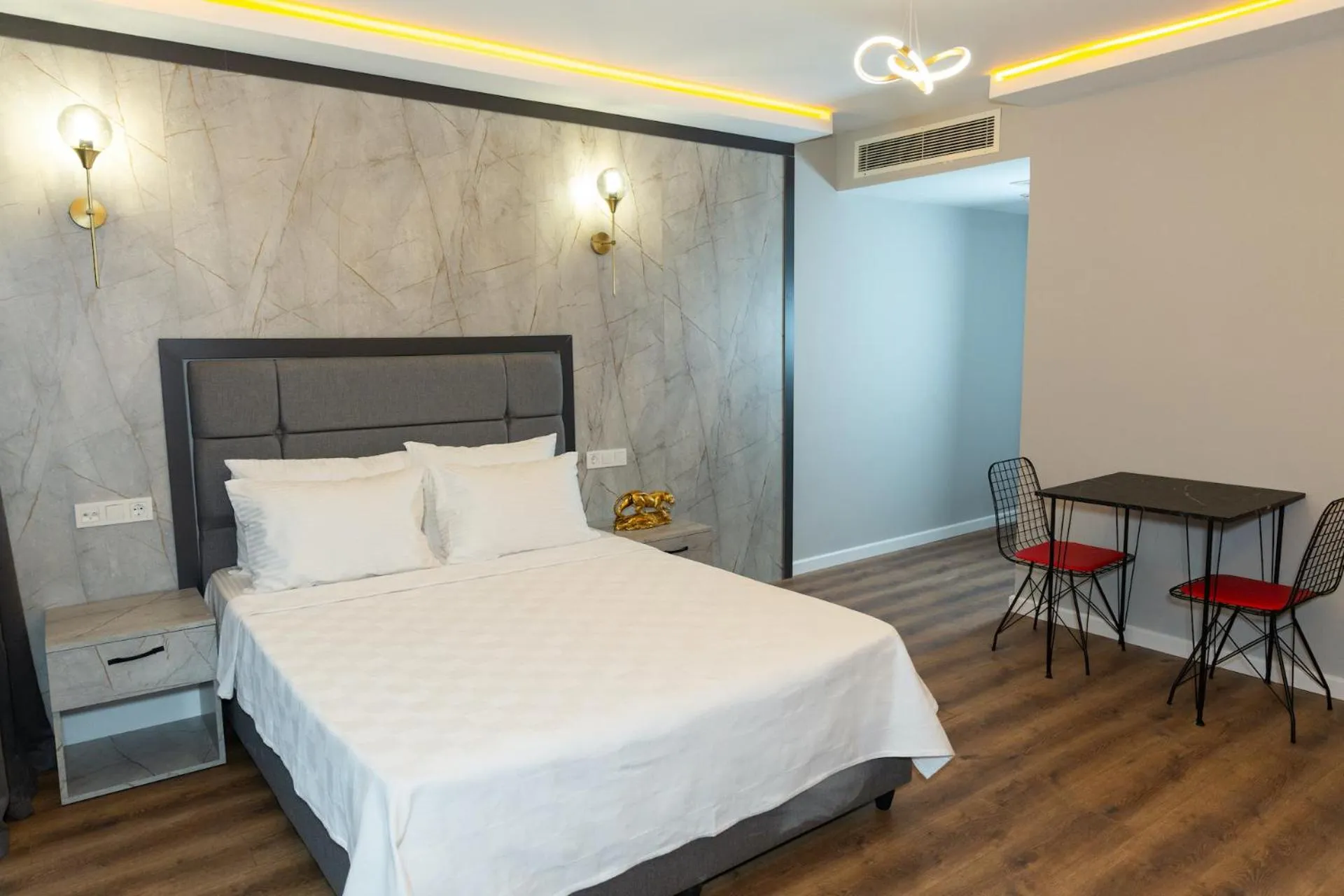 Bed in The Hera Business Hotels & Spa