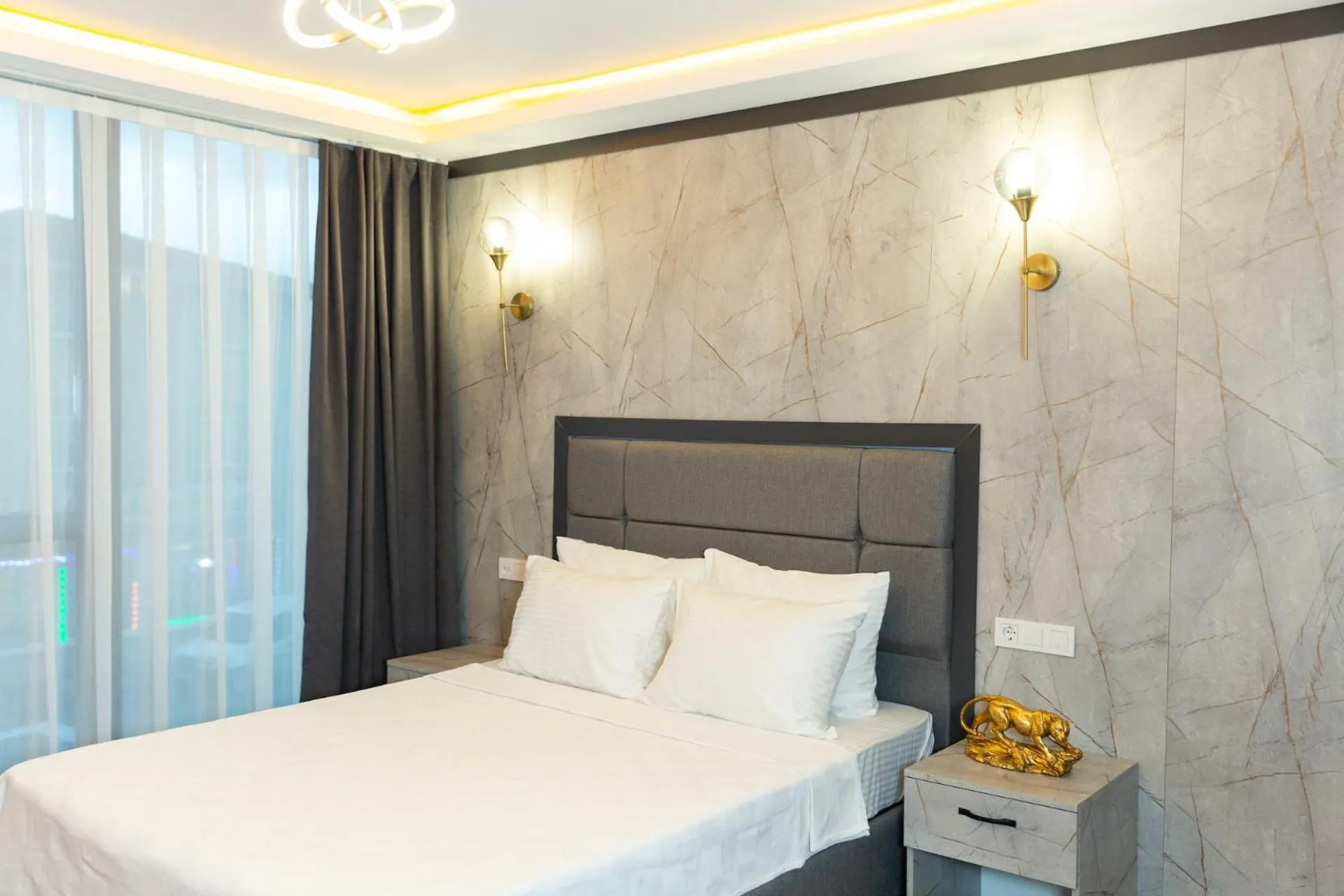 Bed in The Hera Business Hotels & Spa