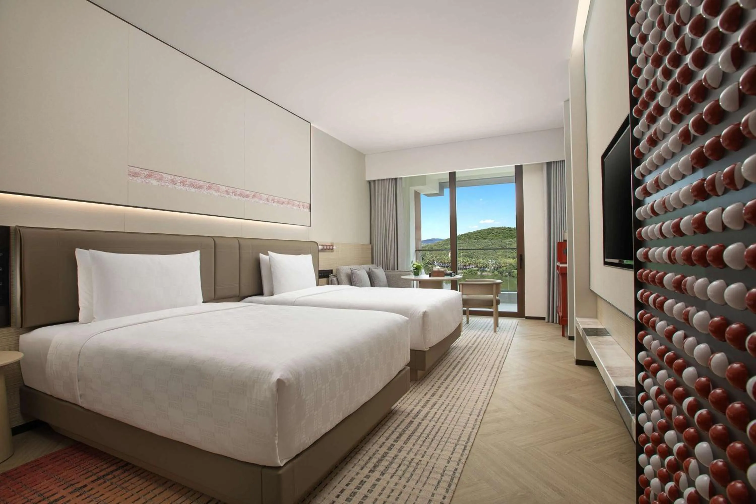 Photo of the whole room, Bed in HUALUXE Sanya Yalong Bay Resort