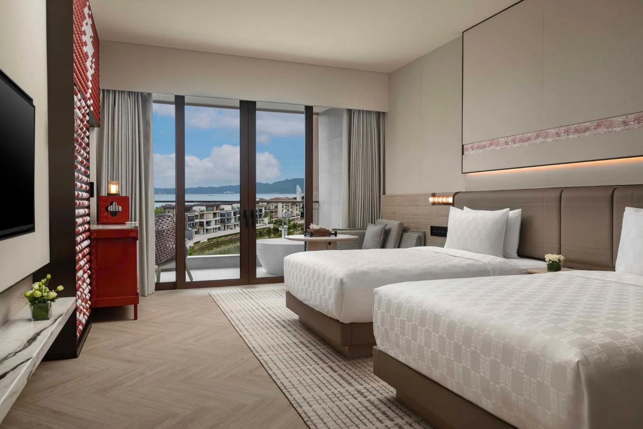 Photo of the whole room, Bed in HUALUXE Sanya Yalong Bay Resort