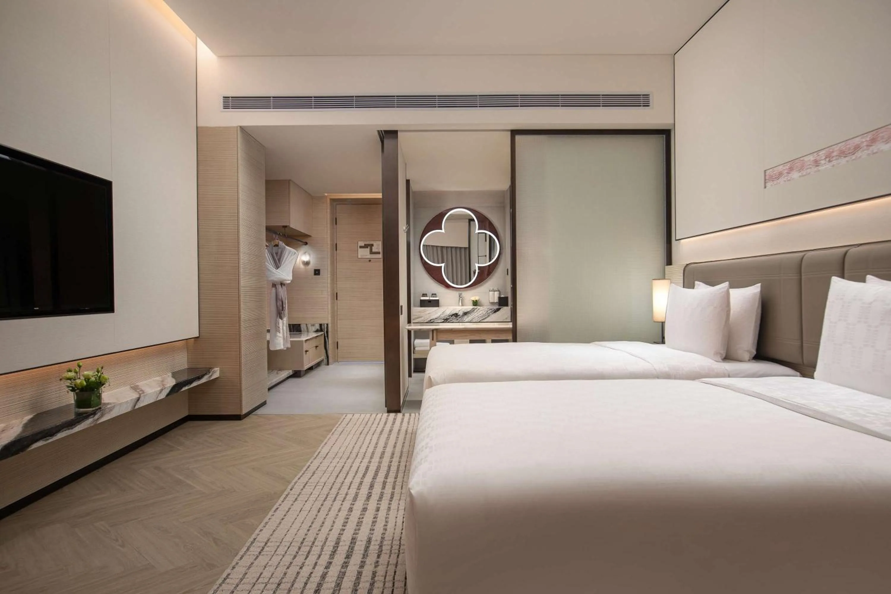 Photo of the whole room, Bed in HUALUXE Sanya Yalong Bay Resort