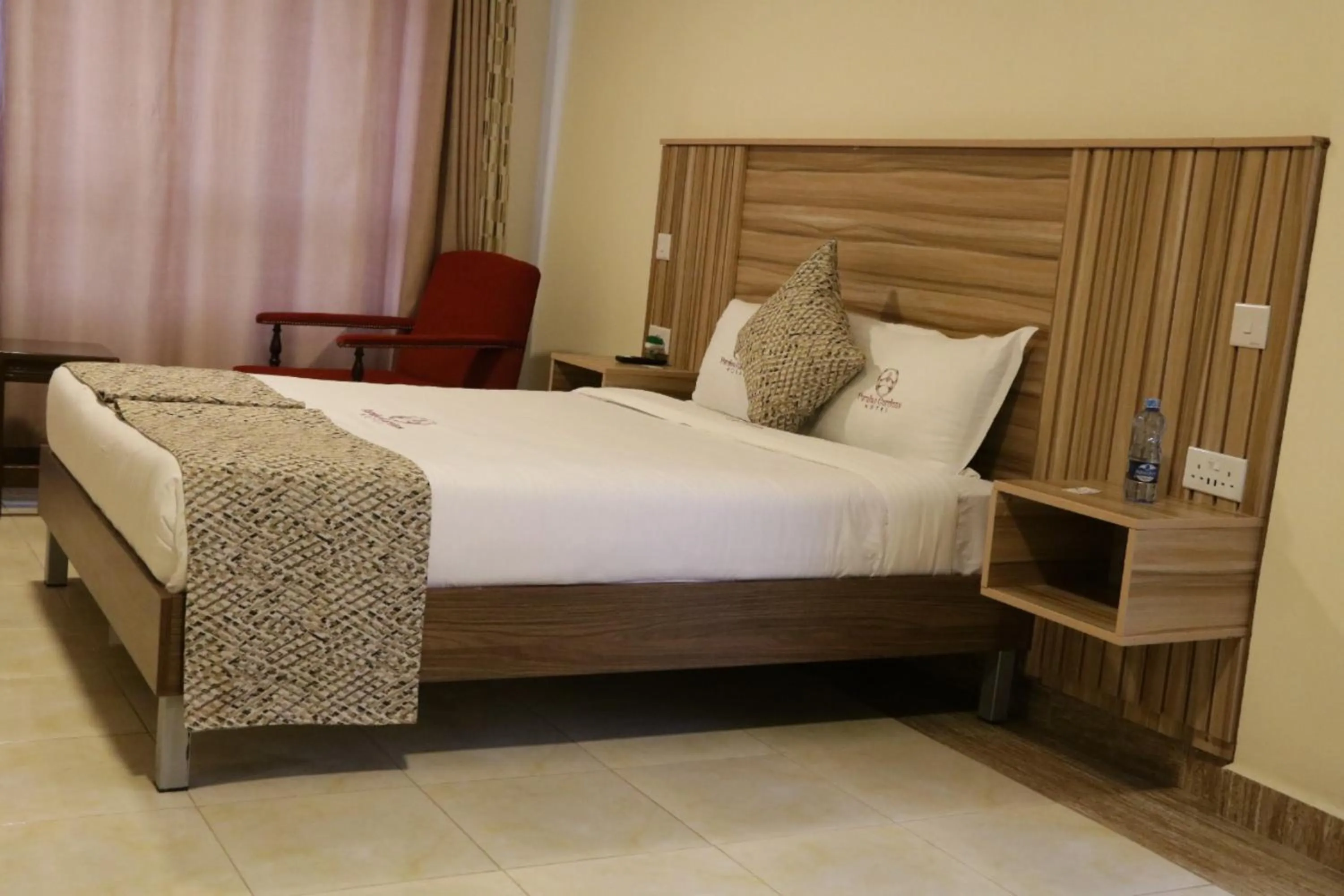 Bed in Paraiso Gardens Hotel
