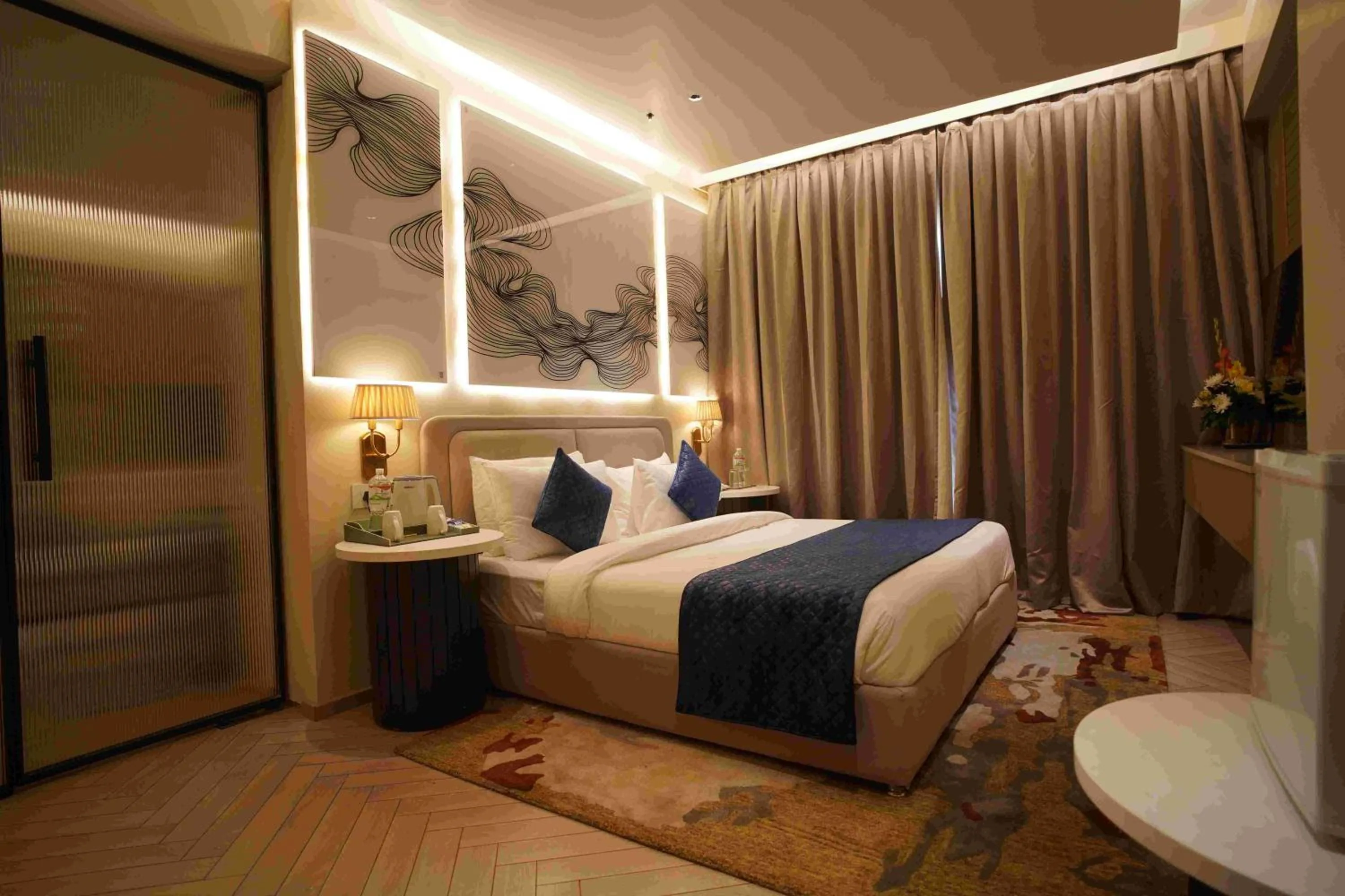 Photo of the whole room, Bed in Chinmay Hotel & Resort