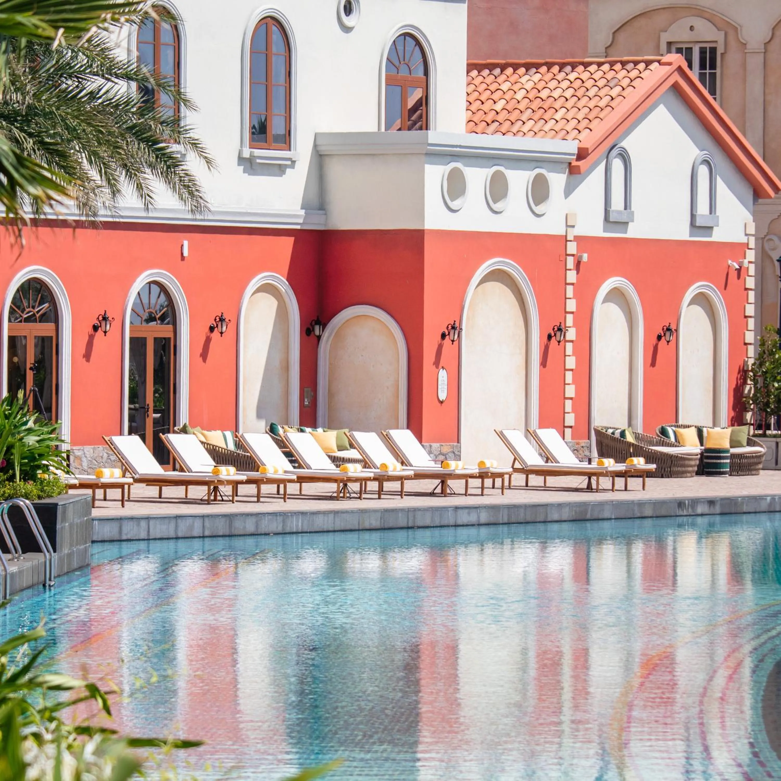 Swimming pool in La Festa Phu Quoc, Curio Collection By Hilton