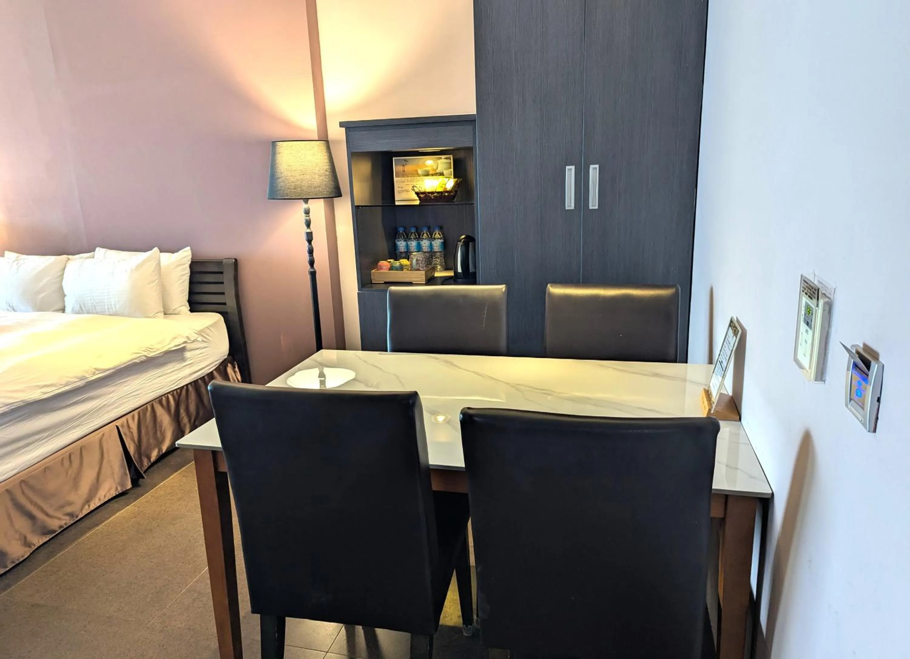 Bed in Jing Guan Hotel