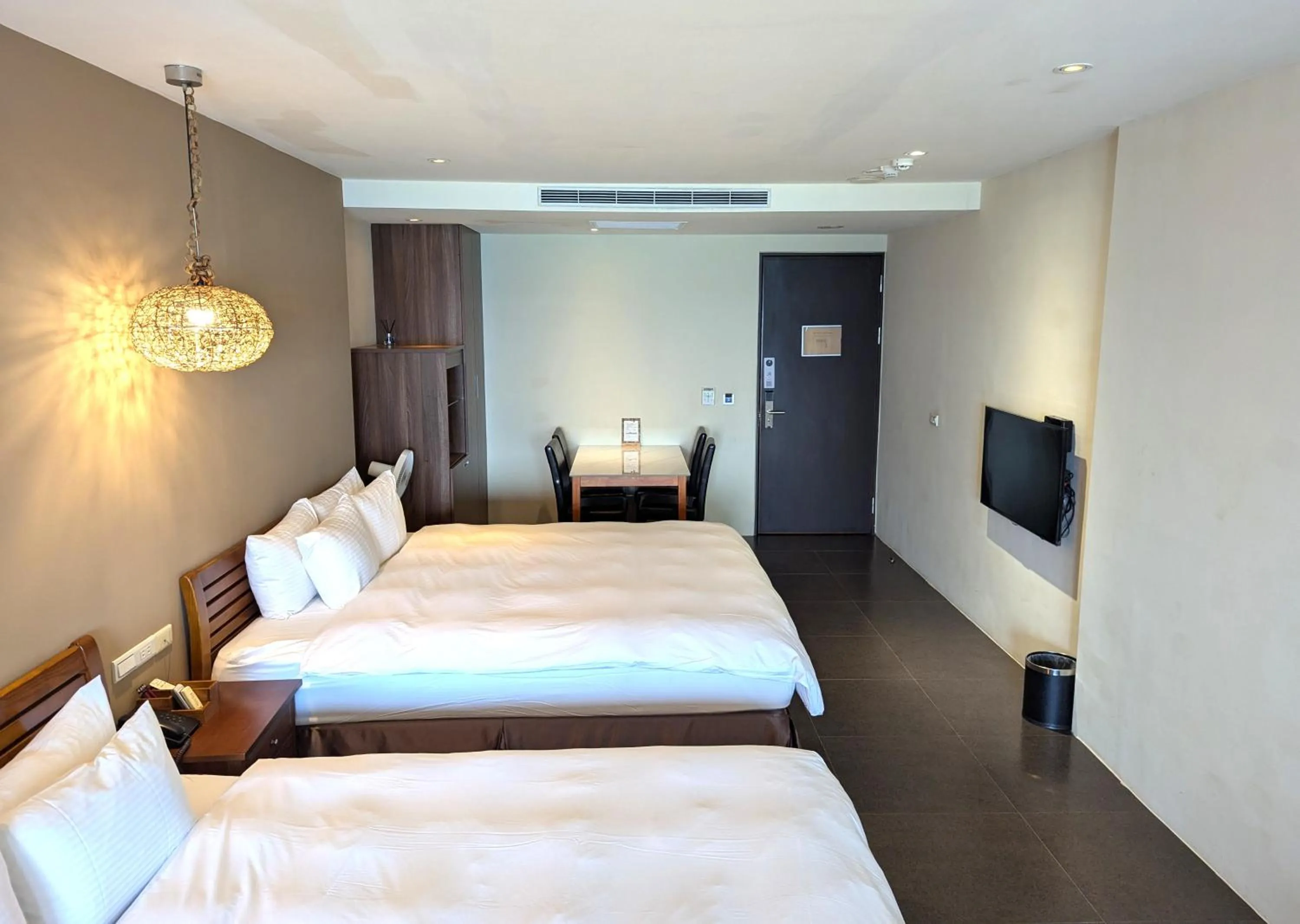 Bed in Jing Guan Hotel