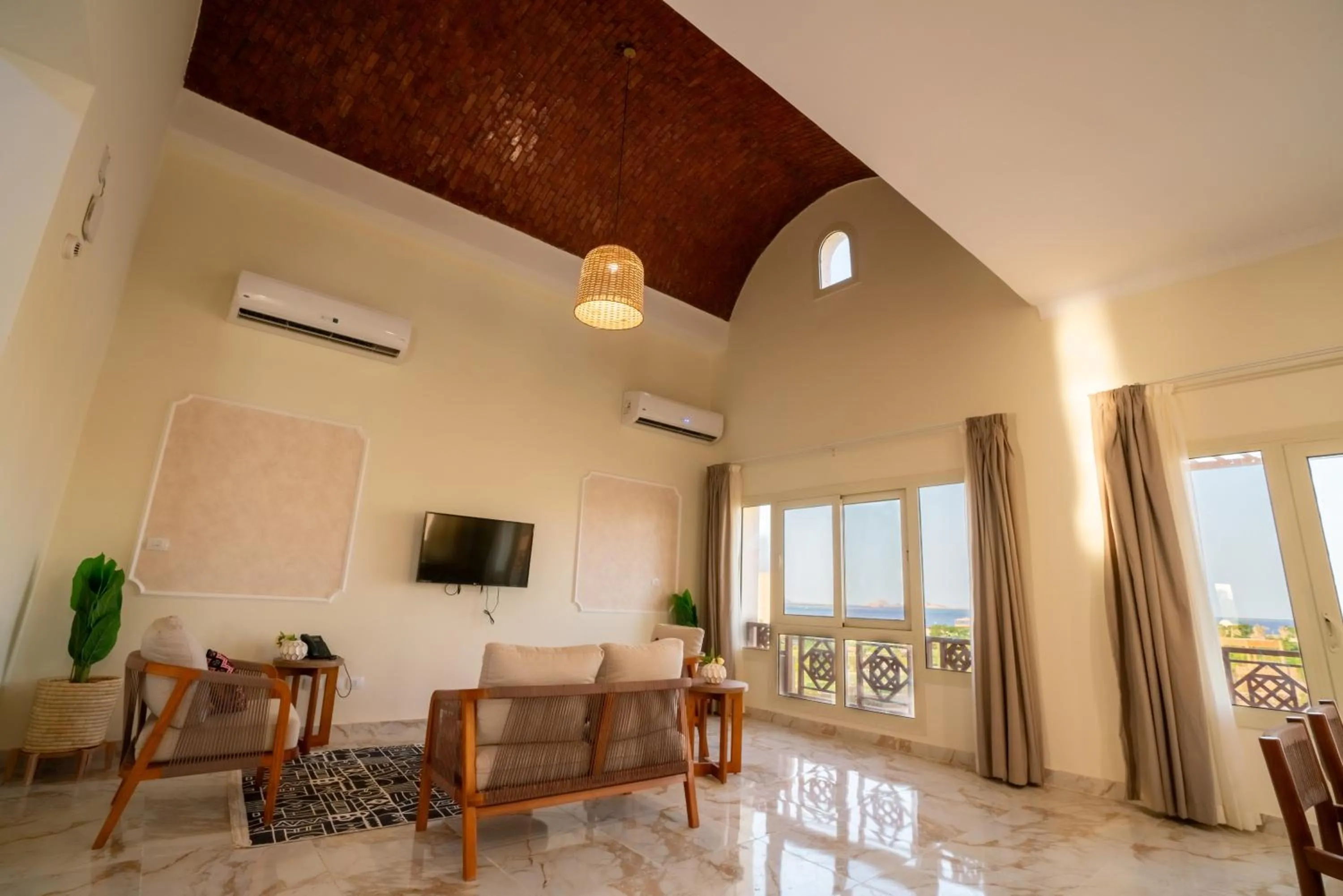 Communal lounge/ TV room in Azal Lagoons Resort Abu Simbel