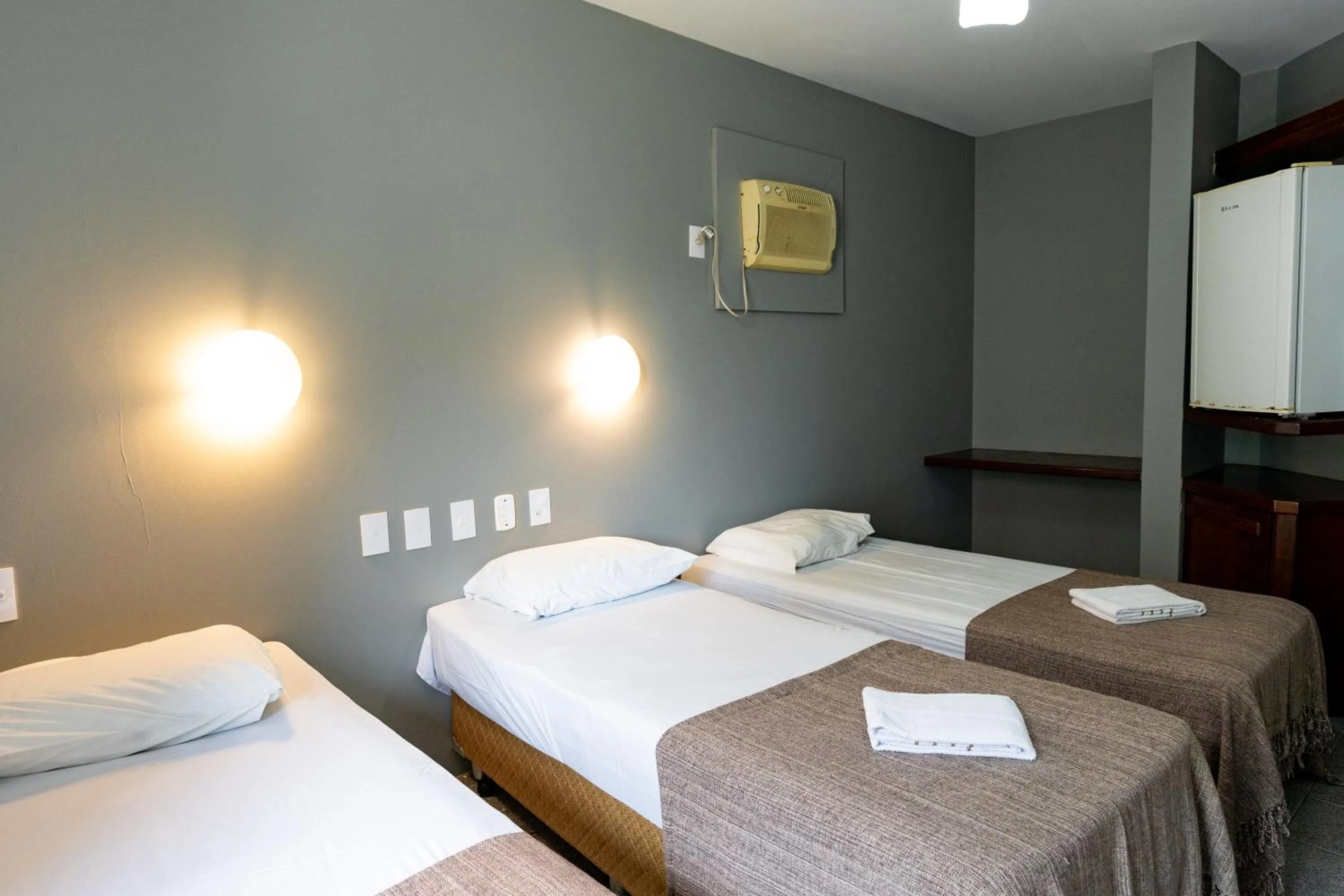 Photo of the whole room, Bed in HANNA Praia Hotel - Florianópolis