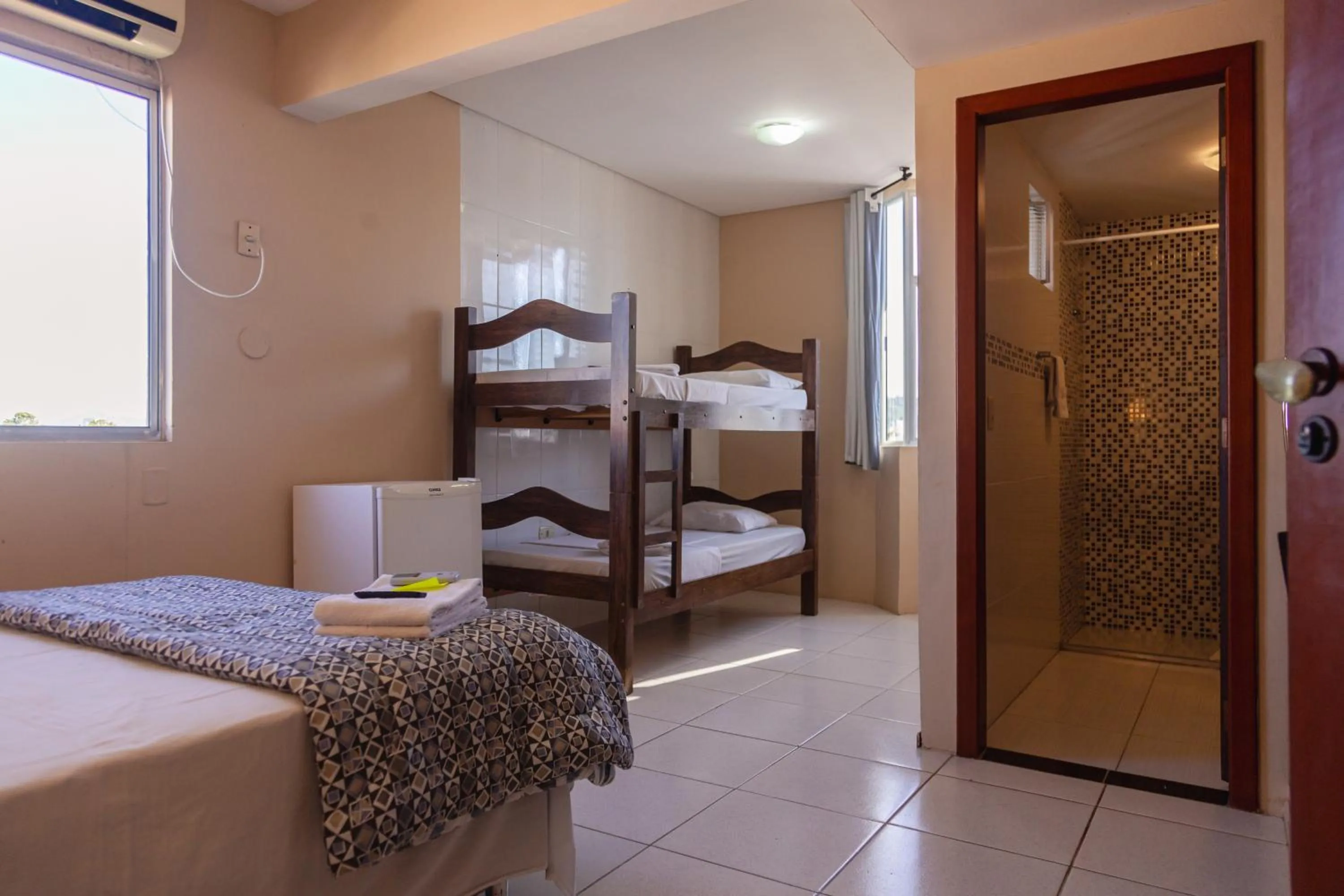 Photo of the whole room, Bed in HANNA Praia Hotel - Florianópolis