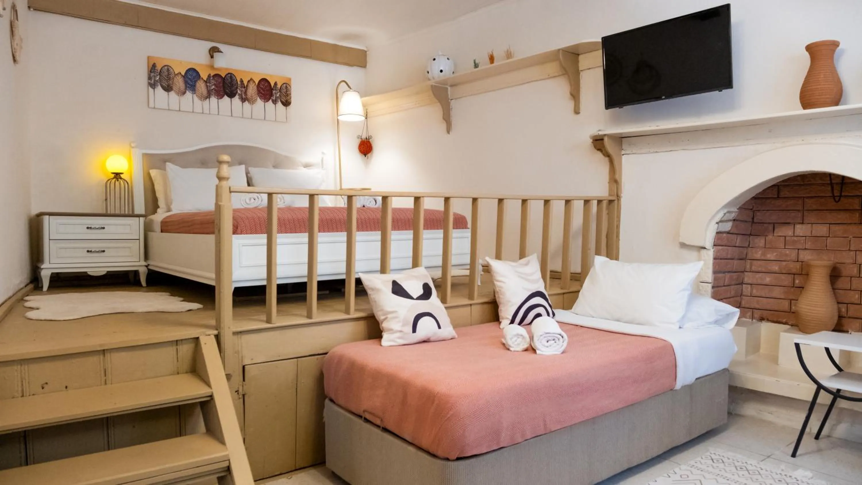 Bed in Garden Palace Boutique Hotel