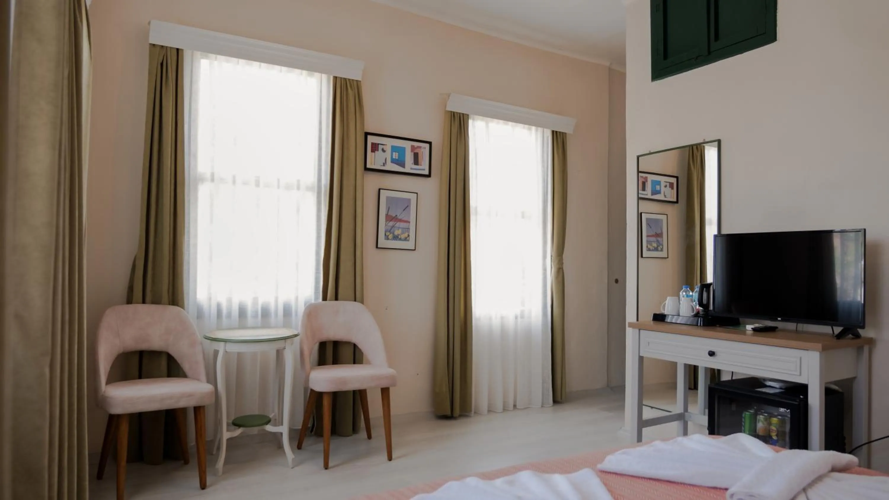 Bed in Garden Palace Boutique Hotel