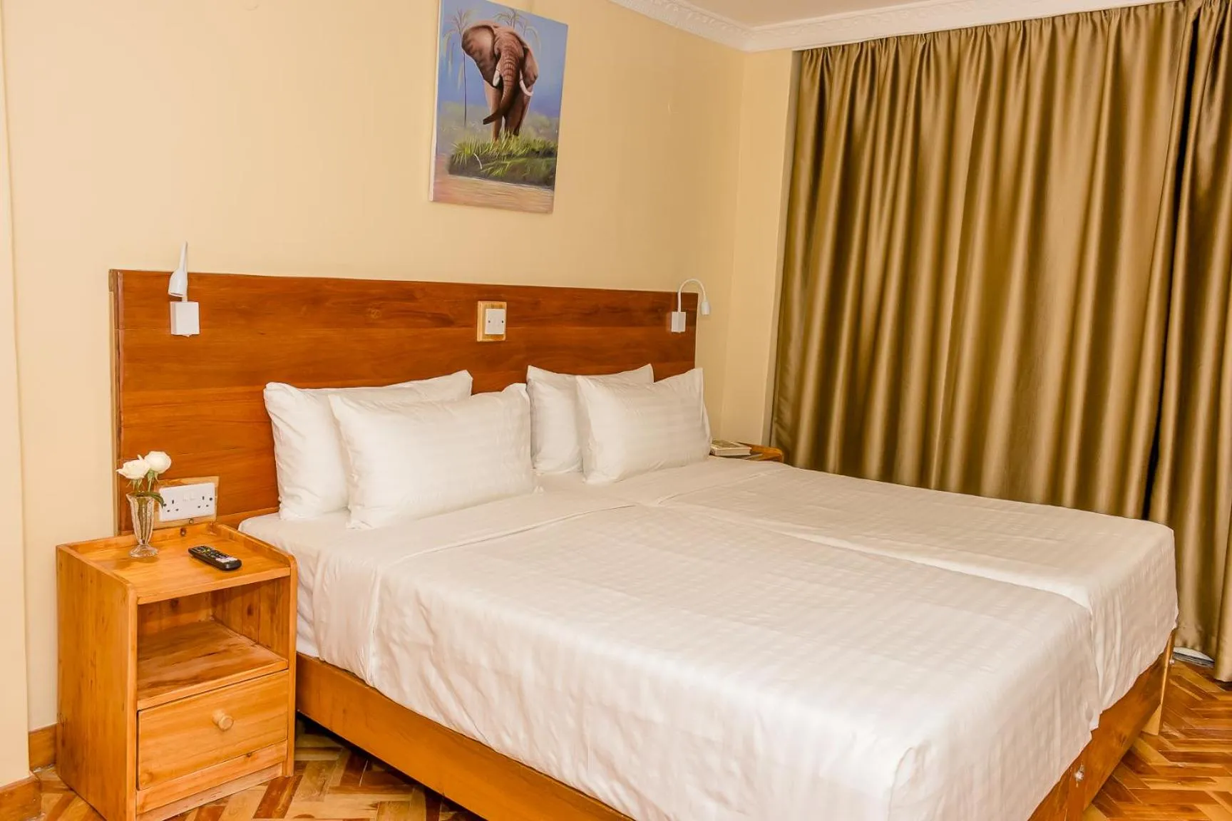 Bed in The Glacier Hotel Nanyuki