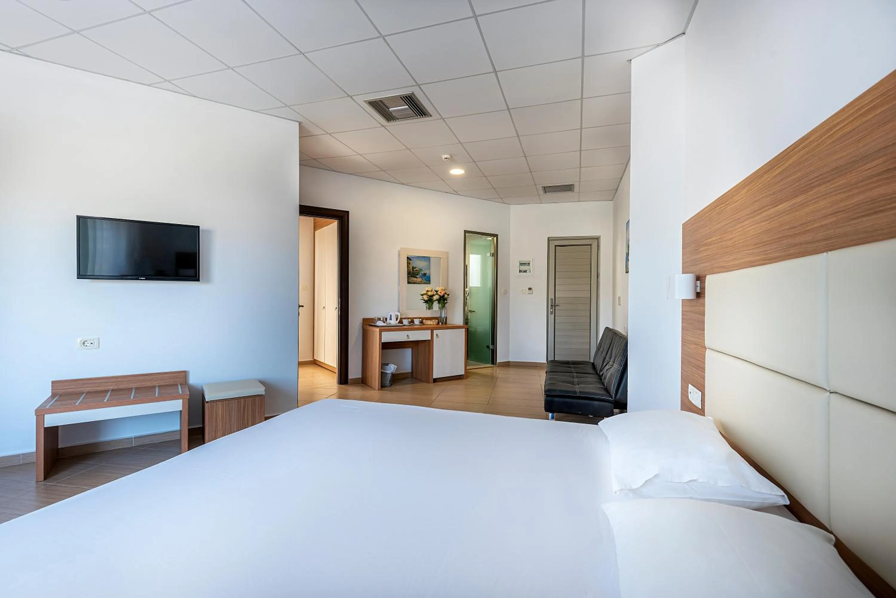 Bedroom, Bed in Royal Bay Suites