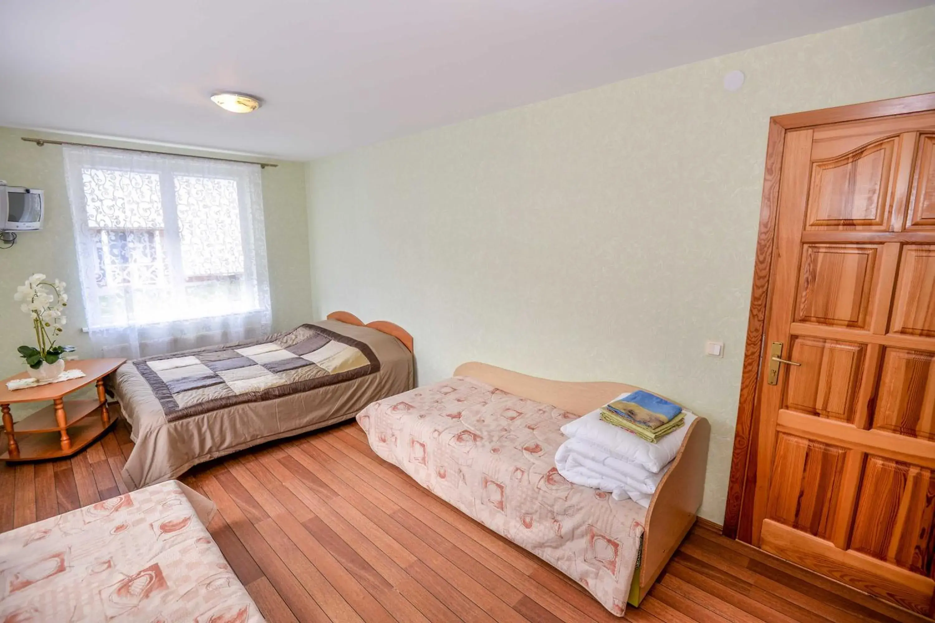 Economy Quadruple Room with Shared Bathroom in Sodyba Džiugutis Economy Quadruple Room with Shared Bathroom in Sodyba Džiugutis