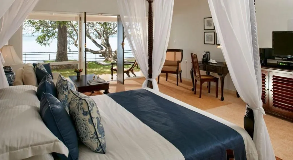 Bed in EKHO Lake House - From Colonial Bungalow to Royal Retreat