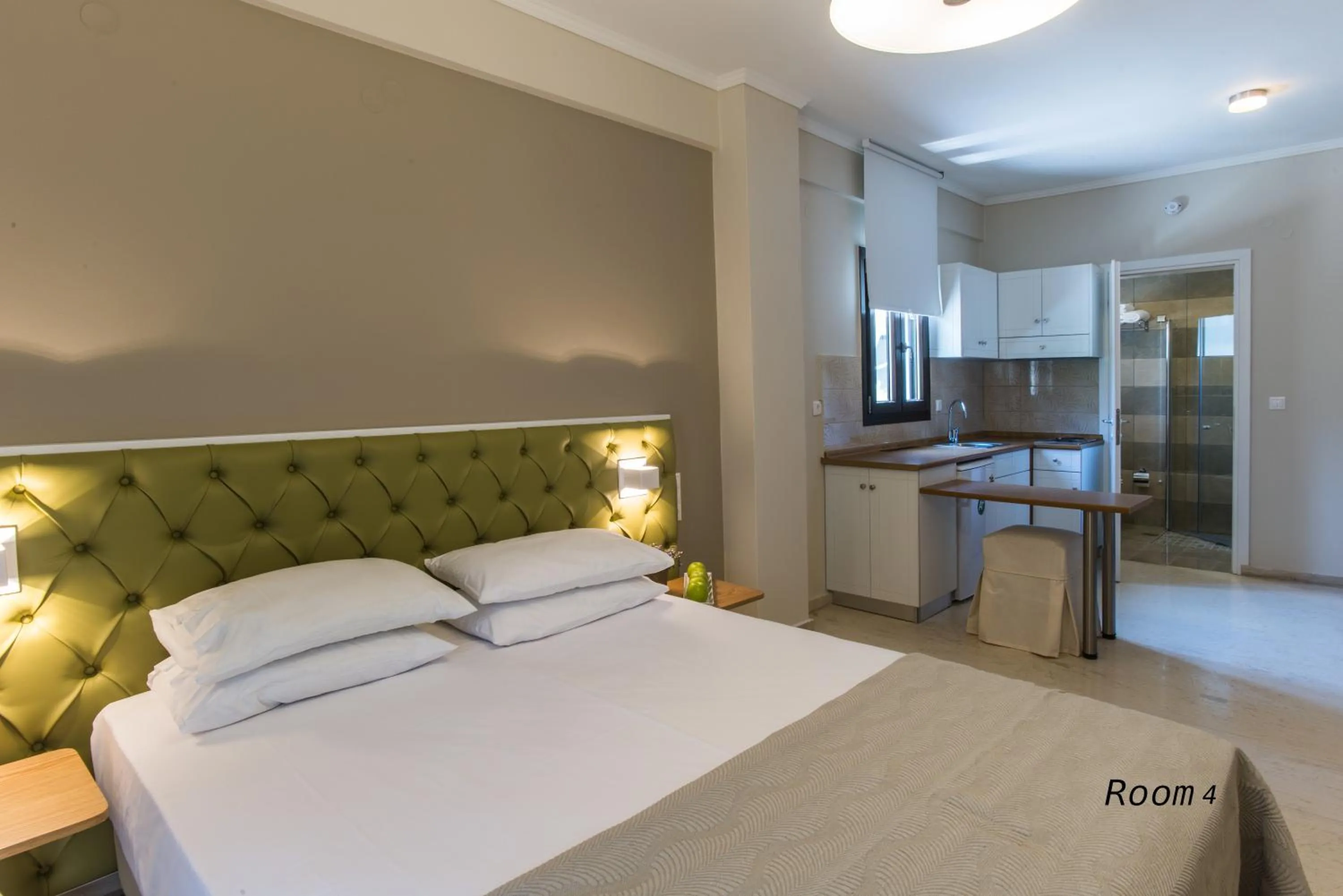 Kitchen or kitchenette, Bed in Hotel Oriana - Adults Only