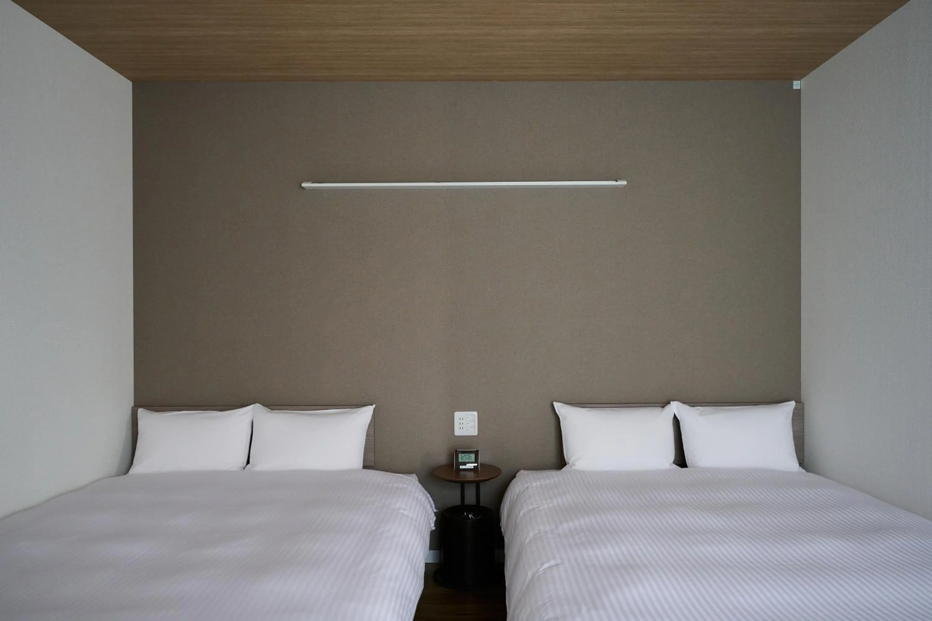 Bed in HOTEL R9 The Yard Kirishimakokubu