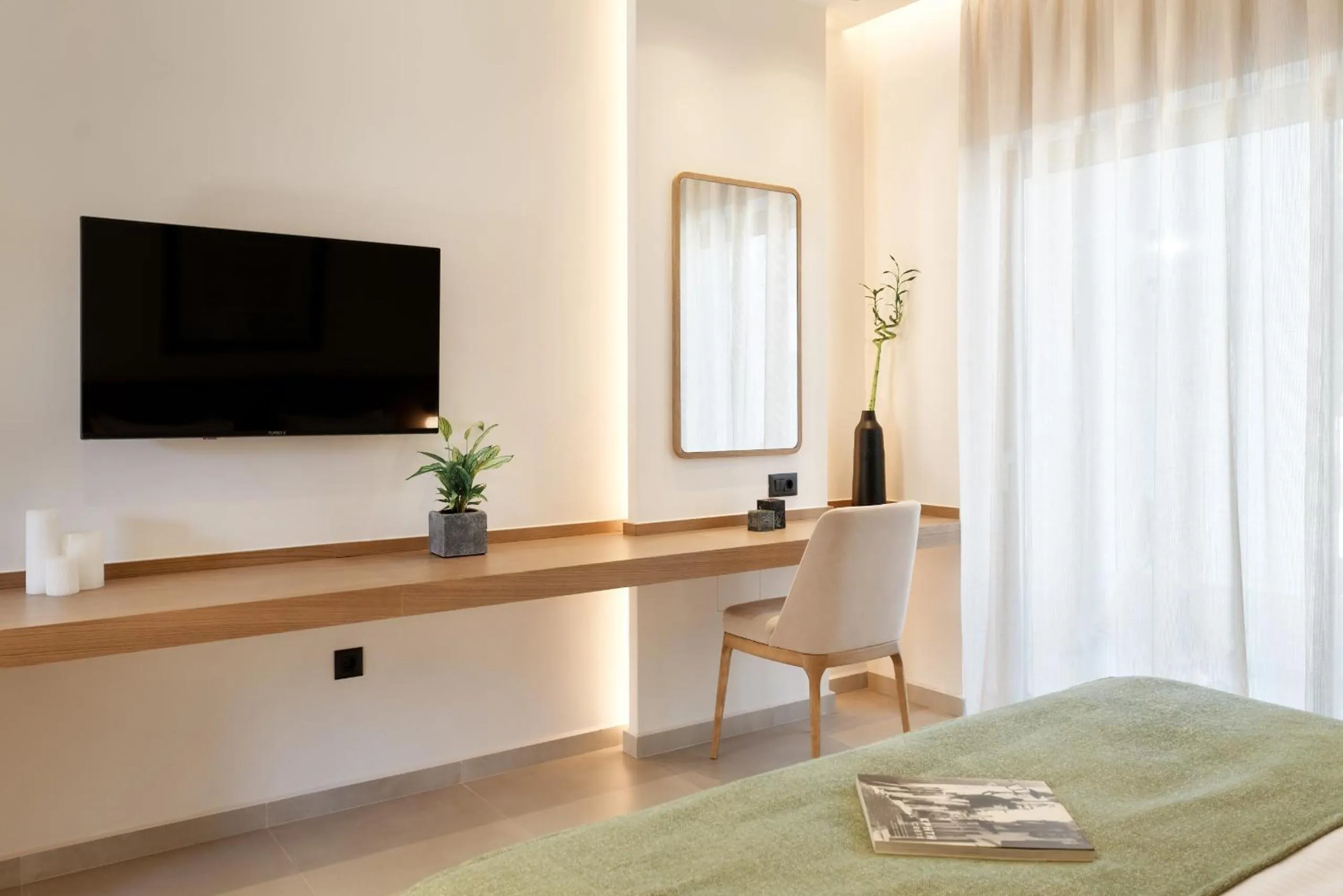 TV and multimedia in Inea Sole Boutique Hotel