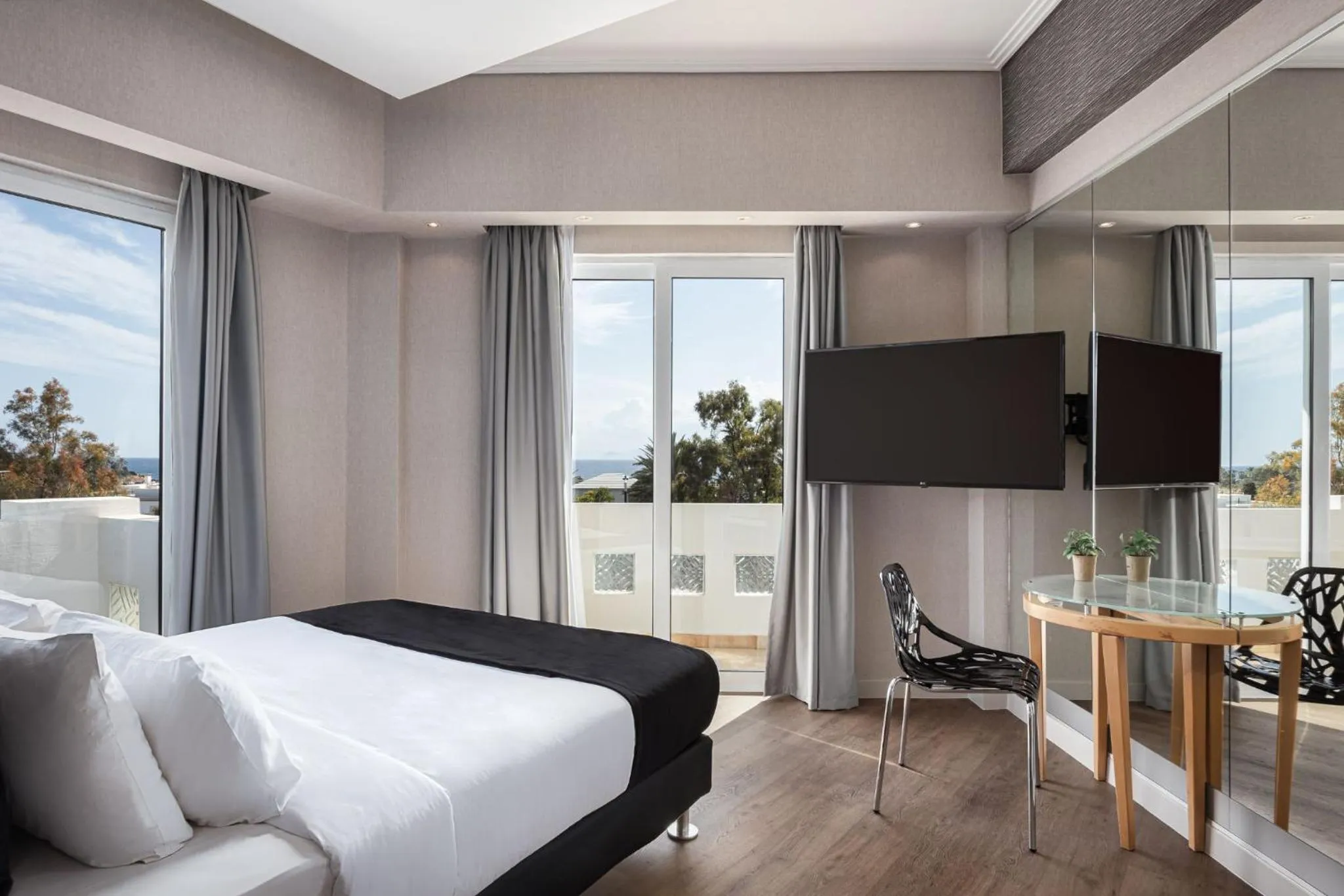 Bed in Kreoli Suites Glyfada