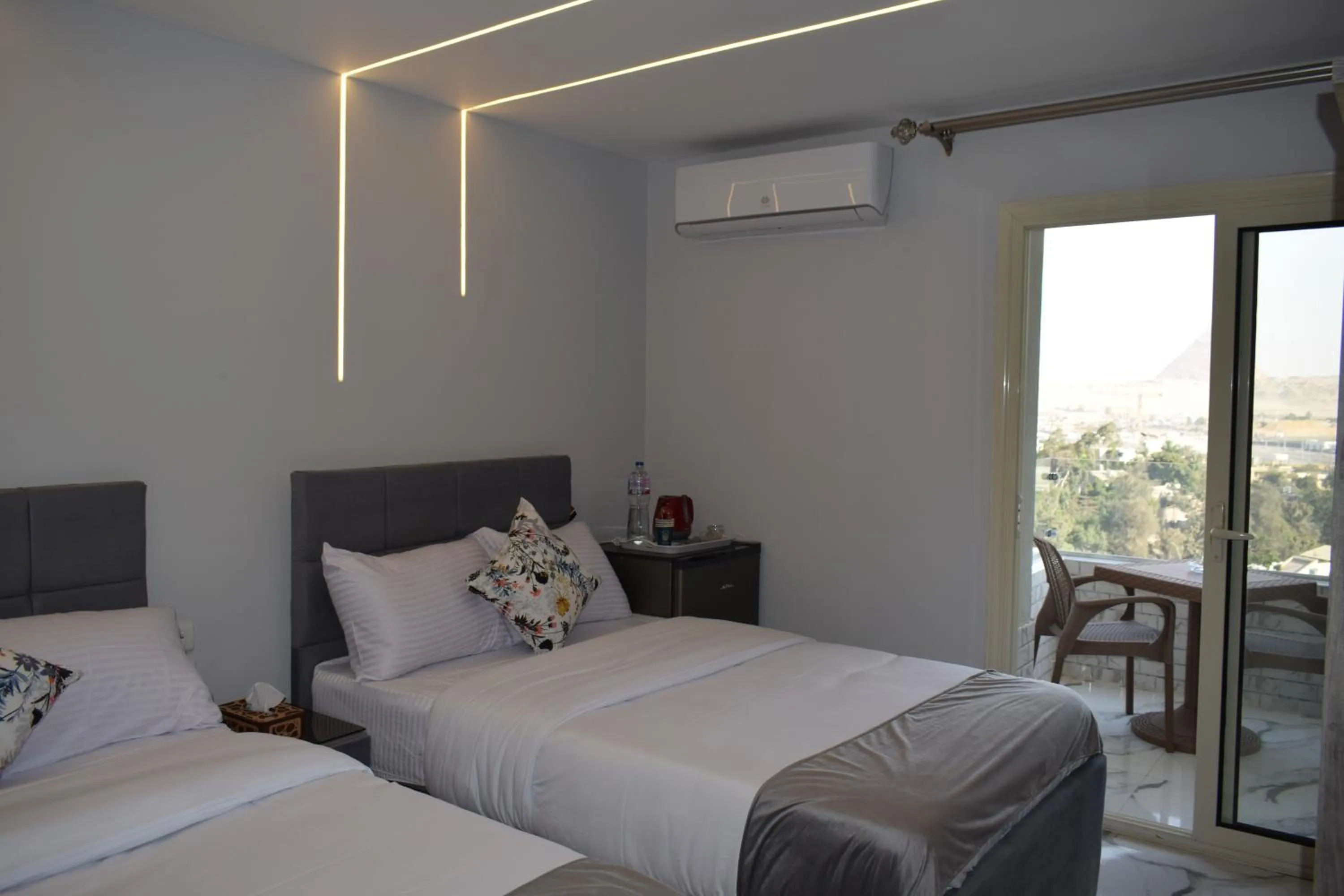 Photo of the whole room, Bed in pyramids grand museum inn