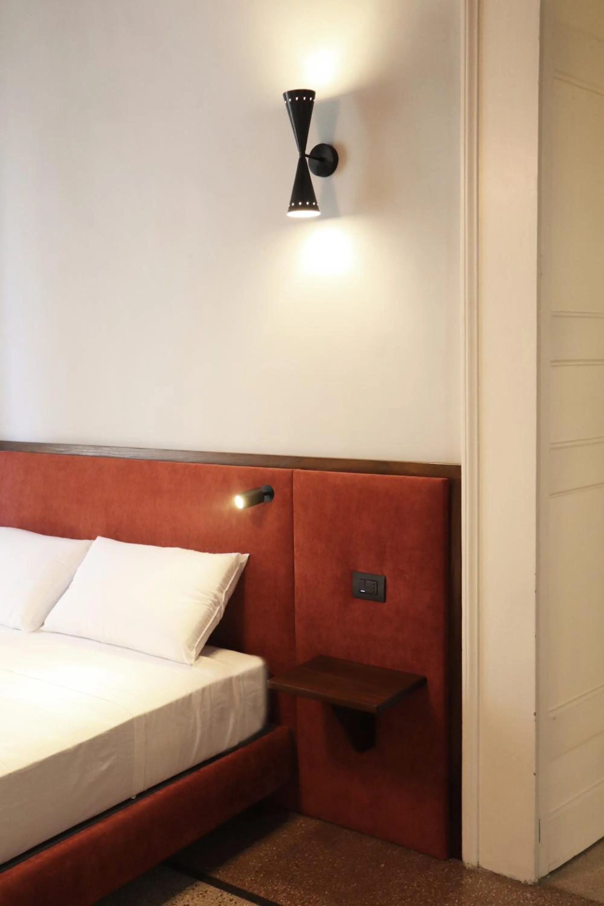 Bed in Roiss Haus Suites