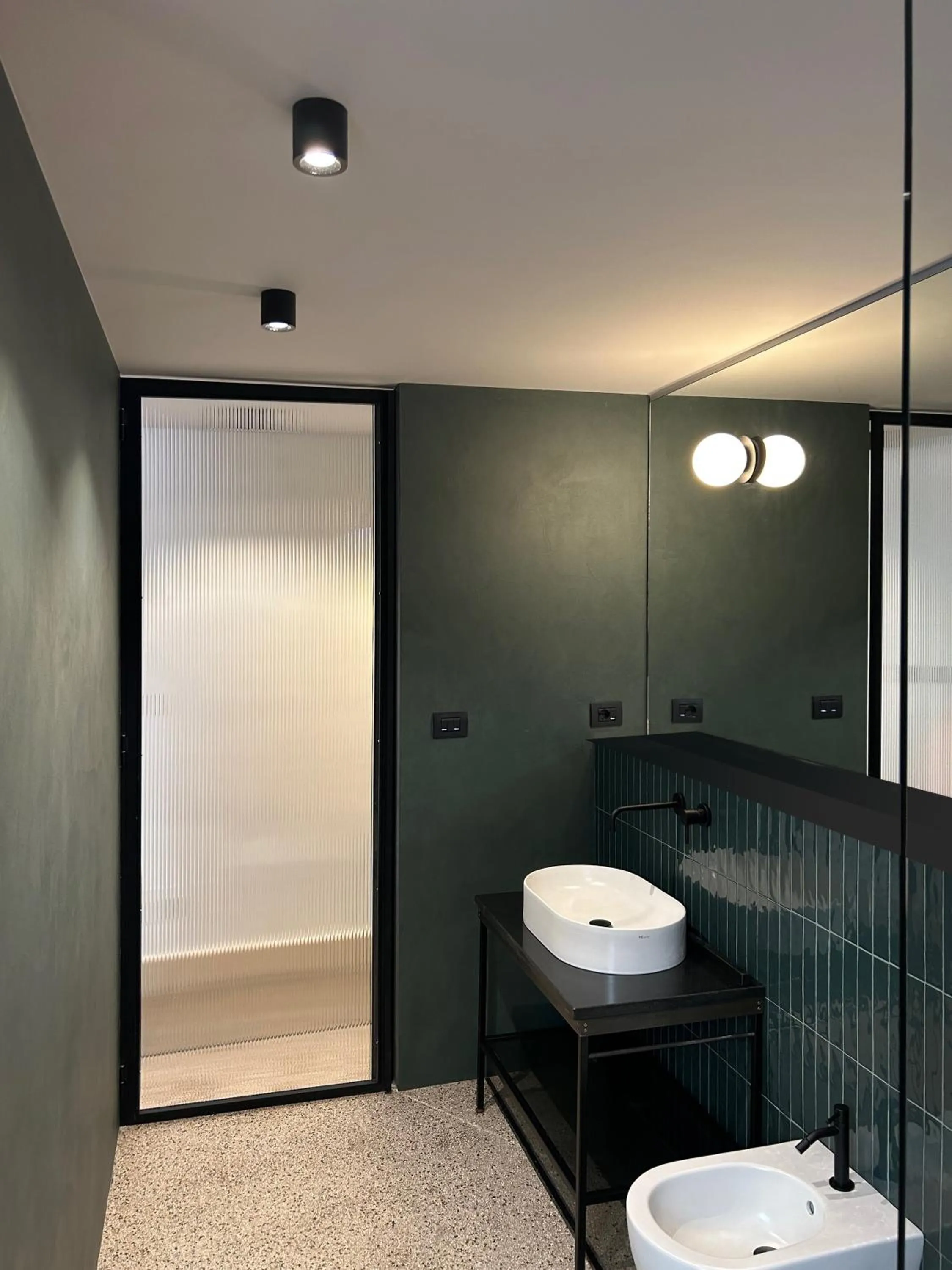 Bathroom in Roiss Haus Suites