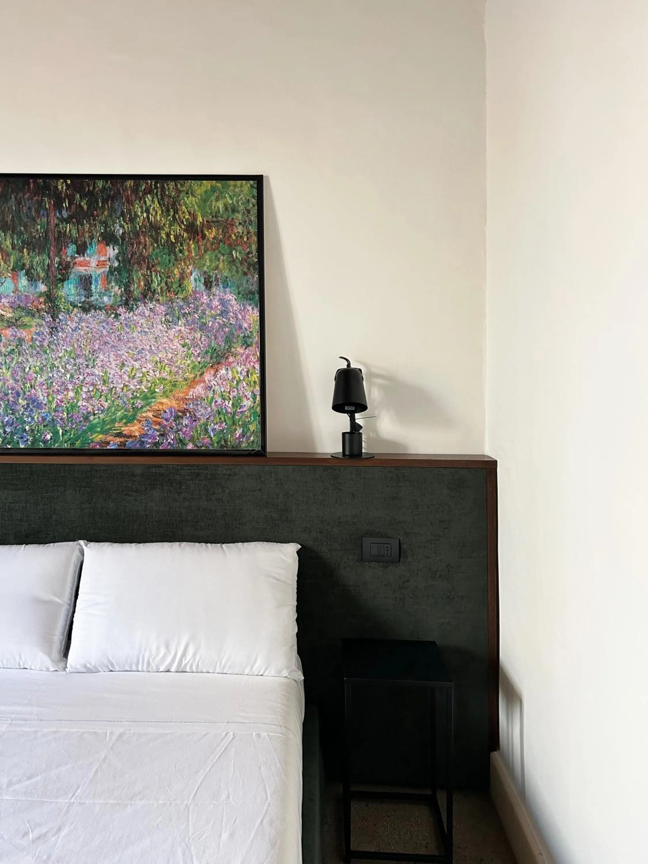 Bed in Roiss Haus Suites