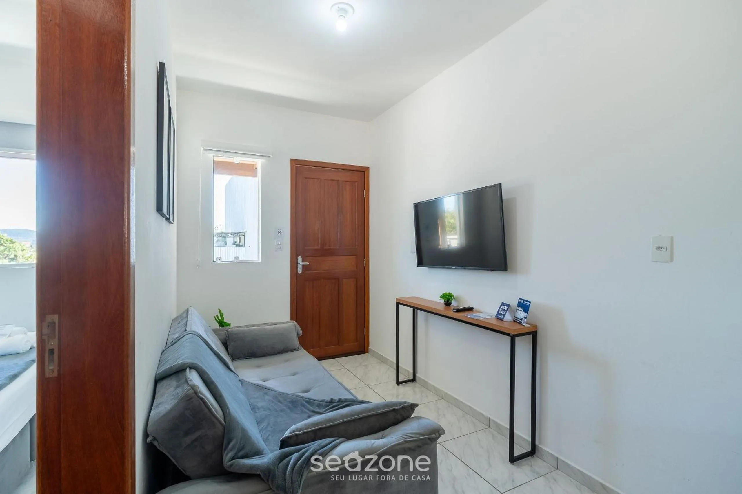 TV and multimedia in Apartamentos em Jurerê - JMA